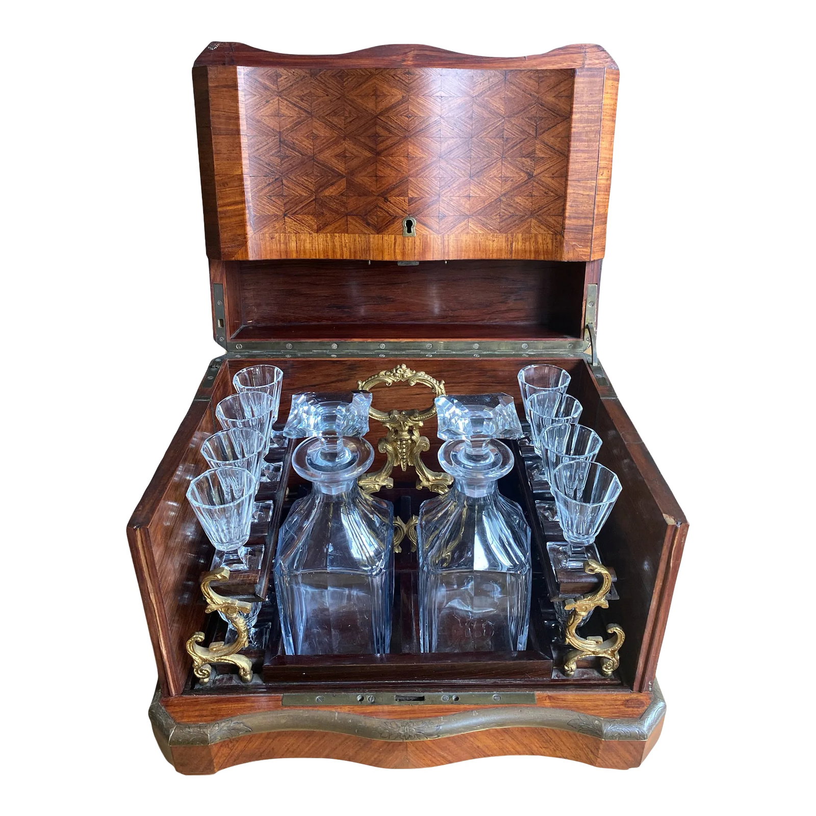 Late 19th Century French Napoleon III Marquetry Tantalus Cellarette Liquor Cabinet With Original Cry: An exceptional French tantalus cave de liqueur cellarette set with exemplary works of marquetry, ormolu, brass-work and mount-blown, hand-cut crystal from the era of Napoleon III; mid-late 1800s. An