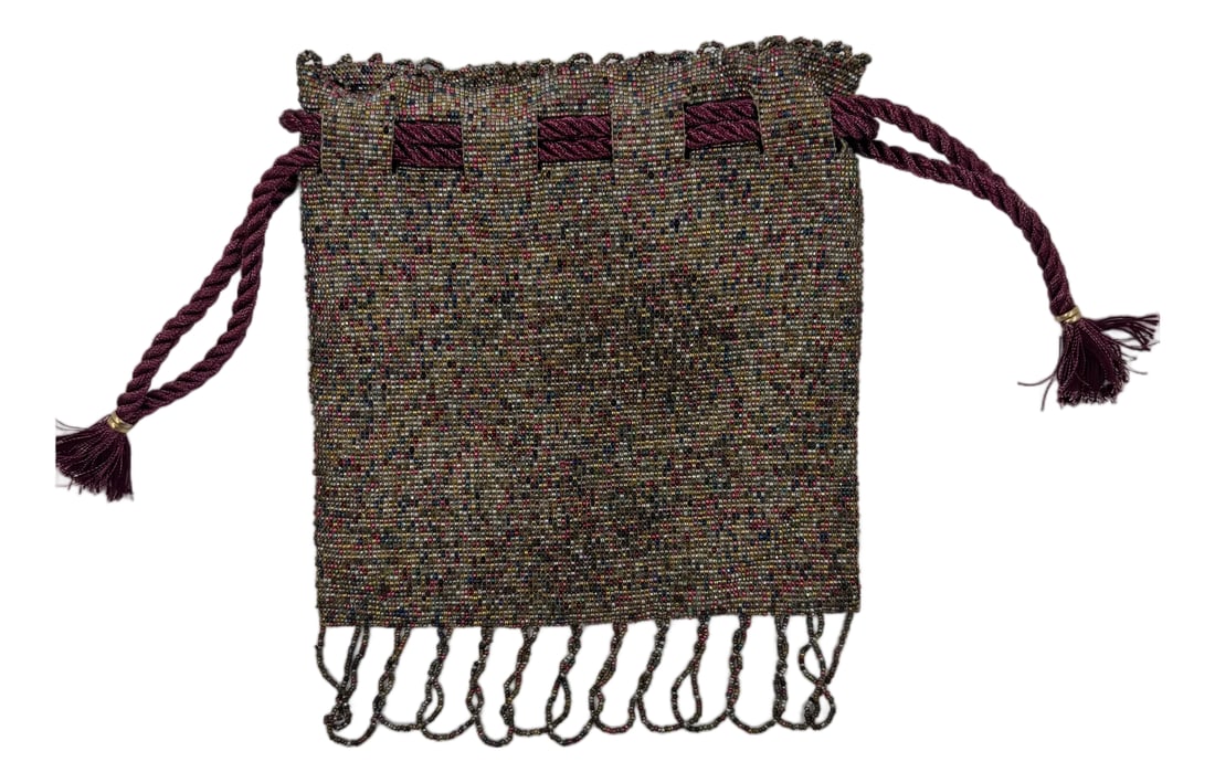 Mid 20th Century Purple Multicolor Purse: This is a super fun colorful micro beaded bag. It has a high quality draw string. The bag itself is made out of multicolor beads. It is finished with fun loops on each end of the bag Condition: