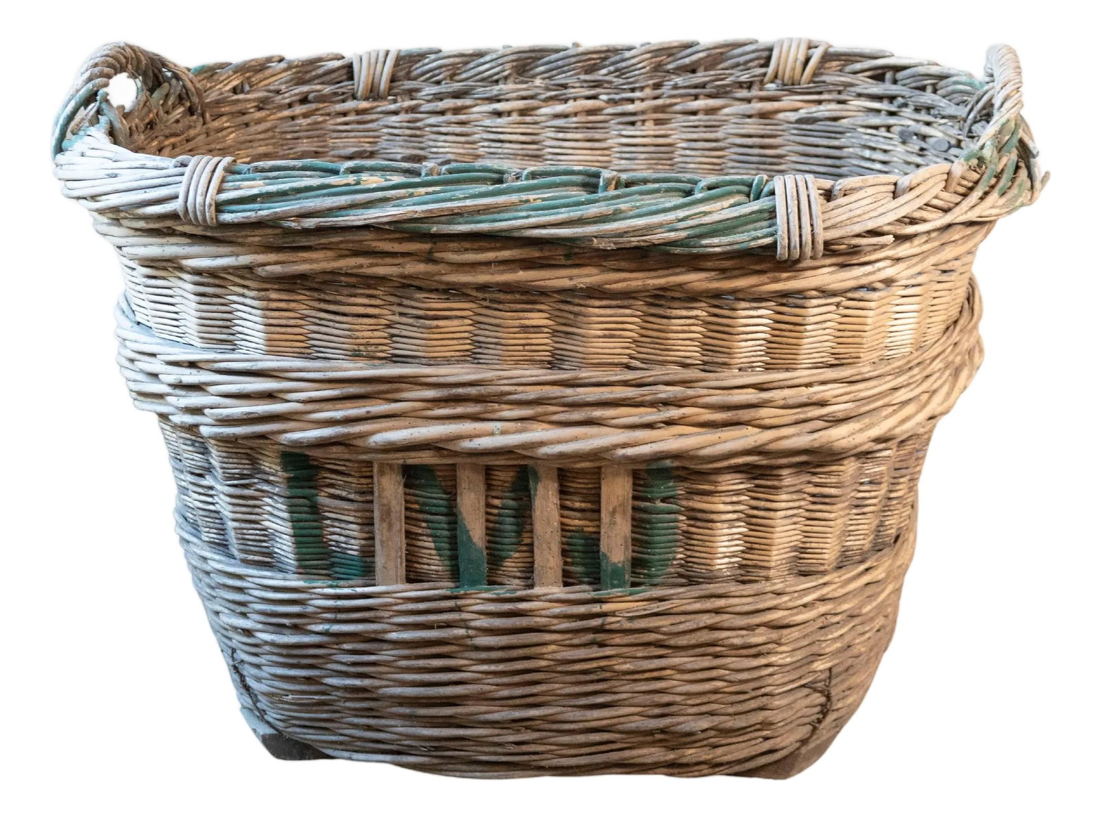 Early 20th Century French Wicker Grape Harvesting Basket: An authentic French grape harvesting basket from the 1940s, sourced from the vineyards of Champagne. Handwoven from sturdy willow, this generously sized basket features a distinctive twisted rim and
