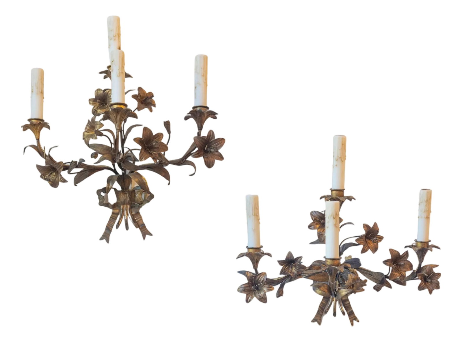 Pair of 20th Century French Gilt TÃ´le Floral Sconces: A charming pair of French gilt tÃ´le wall sconces from the 20th century, featuring a beautifully detailed floral motif. Each sconce has three arms adorned with intricately and beautifully