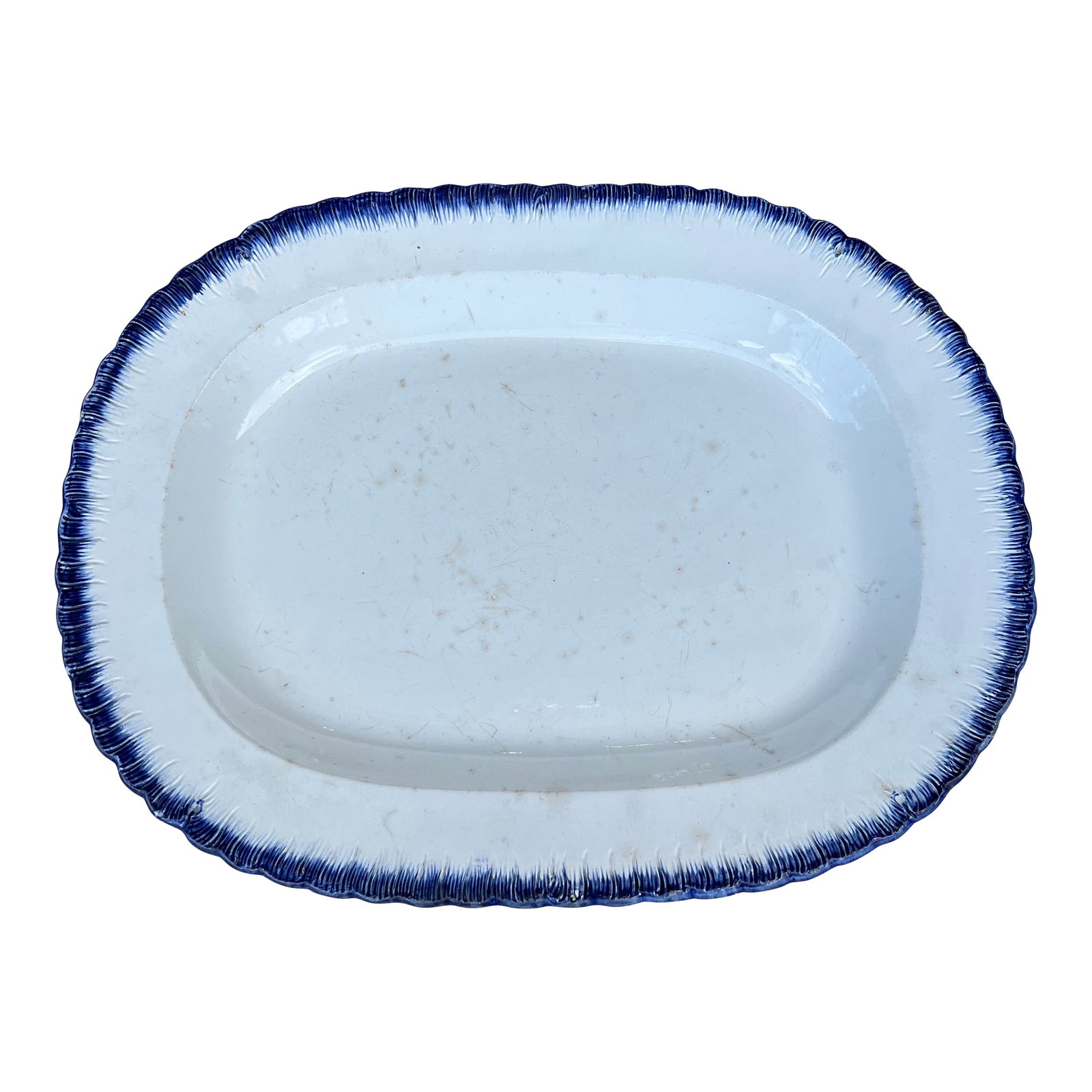 Antique Pearlware Blue Feather Edge Platter, Circa 1820's: Antique Pearlware Blue Feather Edge Platter, Circa 1820's Made in the Staffordshire district of England, circa 1810-1830 Blue glazed feather edge, with a pearlware clay body. Size: 19 1/2" by 15