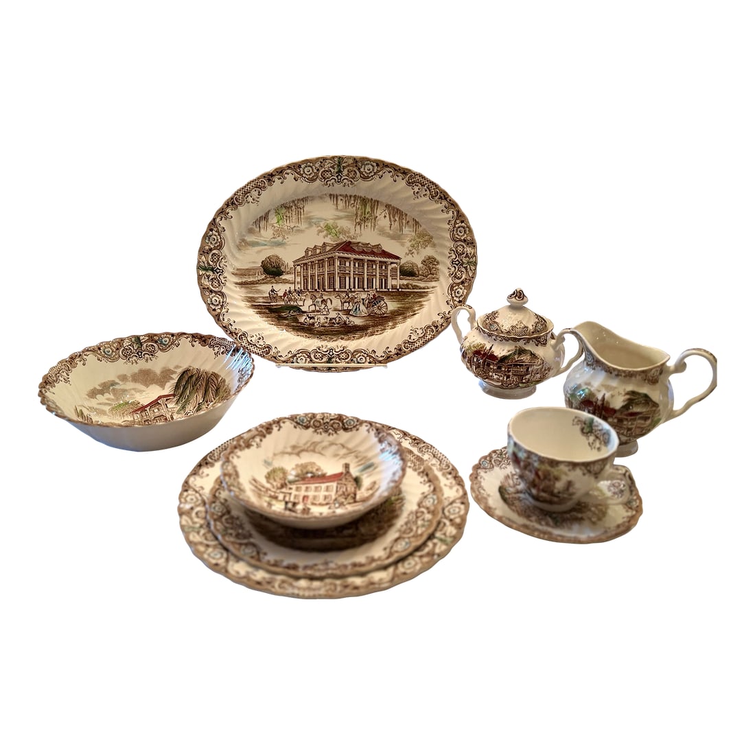 1960s Johnson Brothers Heritage Hall Set - 8 Pieces: Elevate your dining experience with the timeless elegance of the Johnsonville Heritage Hall 8-Piece China Set. This beautifully crafted collection boasts classic design details and fine
