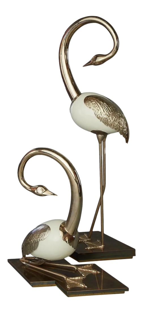 Brass Flamingo / Crane Sculptures by Antonio Pavia - A Pair: Set of brass flamingo / crane sculptures by Antonio Pavia. Standing flamingo is 59" high, 15" deep and 25" wide. Seated flamingo is 32" high, 32" wide and 14" deep. Condition: Alterations: Unknown Imp