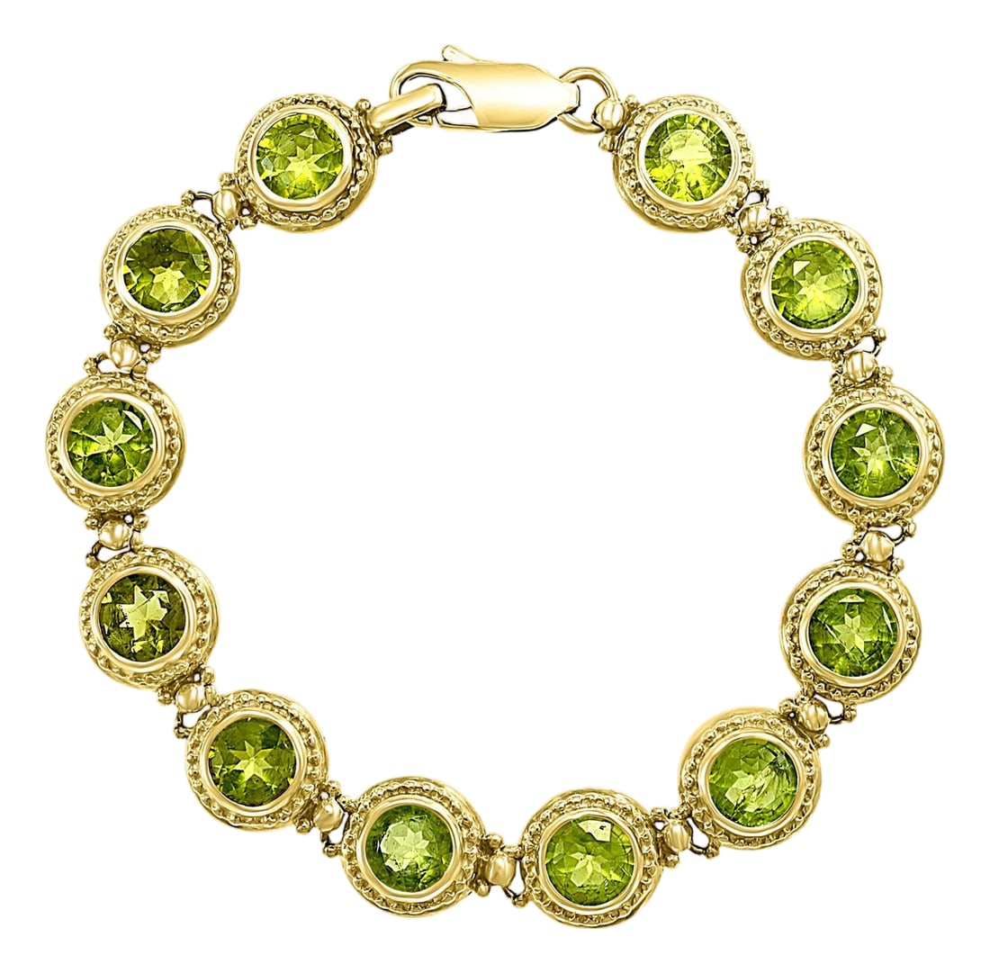 16 Carat Genuine Natural Peridot Tennis Bracelet 14 Karat Yellow Gold 16 Gram: This exceptionally affordable Tennis bracelet has 12 stones of Round shape Peridot Beautiful colors , very Vibrant Size of the stone is approximately 6 mm Round Total weight of these Peridot is approx