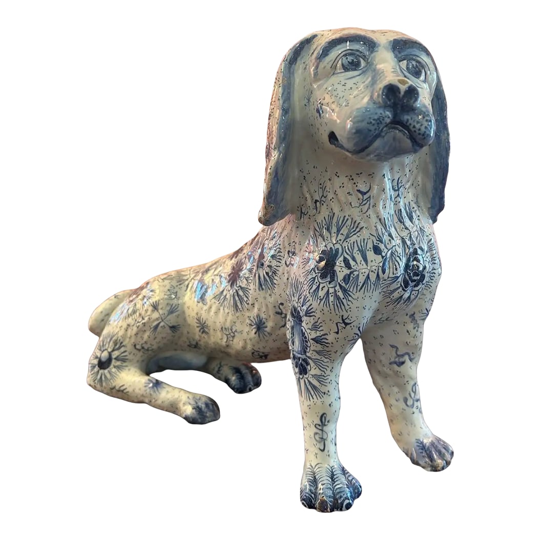 Rare French Faience Dog, Late 19th/Early 20th Century: Fantastic rare and whimsical French faience dog with such a beautiful face and decoration. Marked "france" this piece dates from 1890-1911ish. We have never seen such a thing. Usually the faience