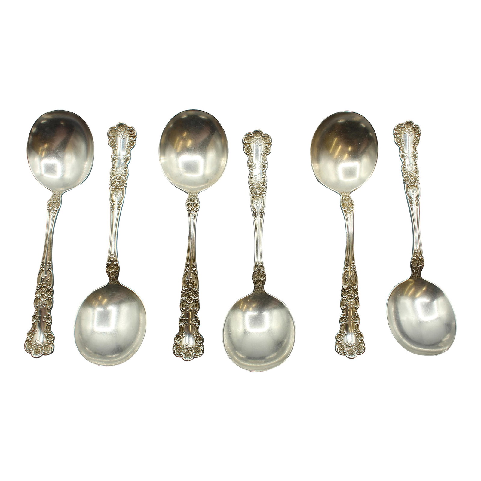Gorham Sterling Silver Cream Soup Spoons- Set of Six: Set of six sterling silver cream soup spoons, Buttercup pattern by Gorham, 1900. Late 19th century Gorham mark - lion, anchor, and G. Sterling, "Patent 1900," monogram en verso. 6.5" x 1.88" bowls.