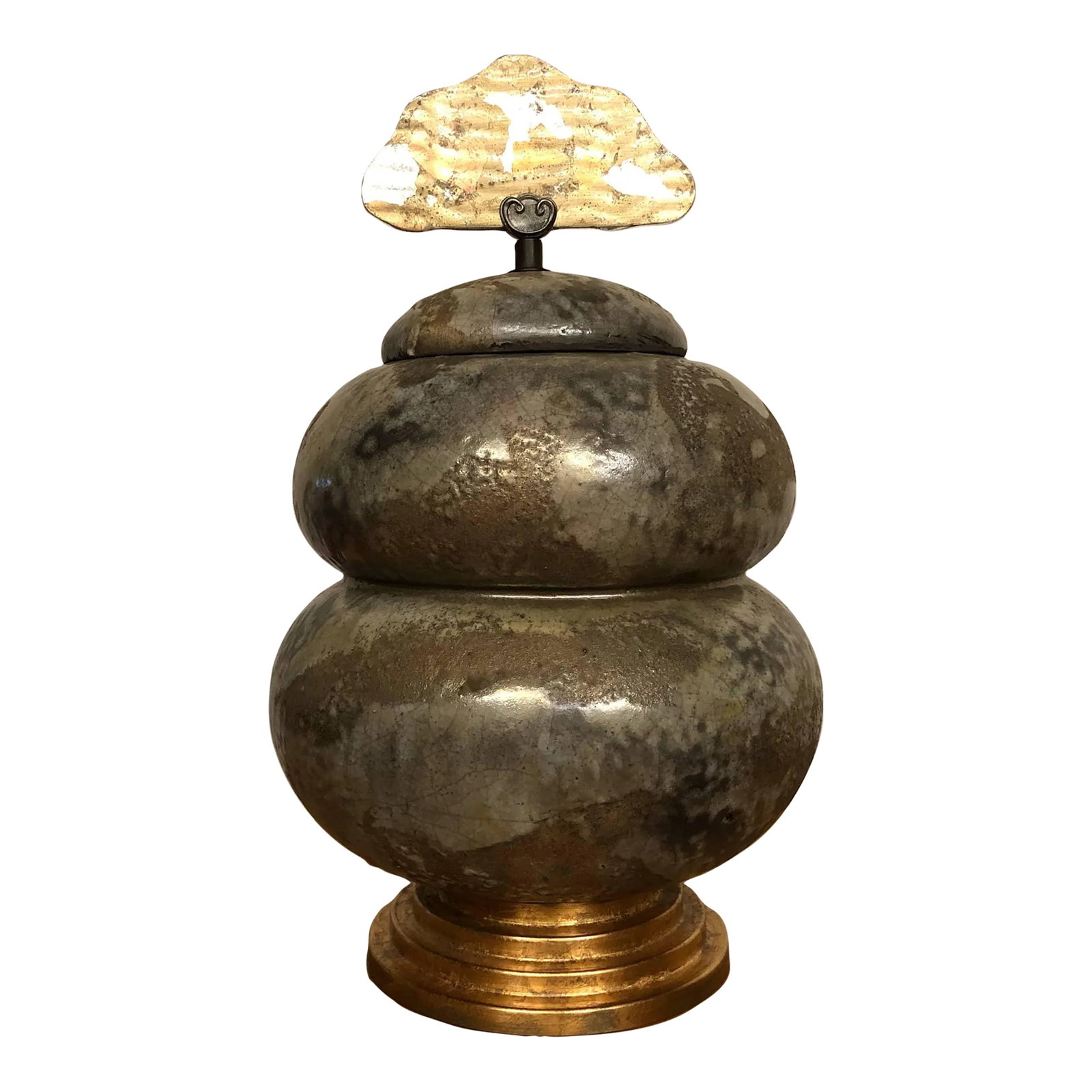 Tony Evans Signed Raku Pottery Urn With Handmade Glass Handle: Tony Evans signed raku pottery with handmade glass handle. It features a double high bulbous body with a stepped gold base. The ceramic part is mostly in mottled shades of gray, some of which lean