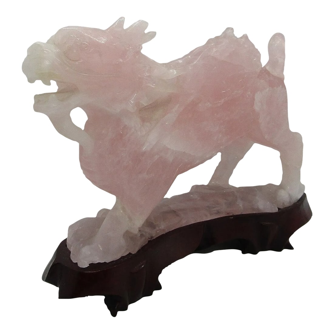 Antique Qing Dynasty Chinese Carved Pink Jade Standing Winged Dragon Sculpture: Qing Dynasty Chinese Carved Pink Jade 9" Long Standing Winged Dragon Sculpture Measures 9" long, 2" wide and 6 3/4" tall0. A magnificent Chinese carved pink jade dragon sculpture, resting on fitted ha