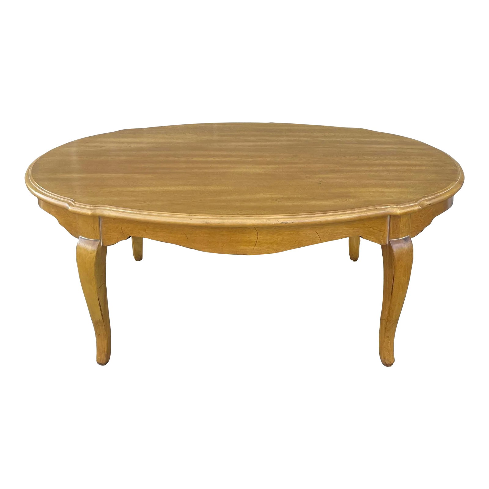 1990s Ethan Allen Country French Birch Oval Coffee or Cocktail Table (26-8220 Provence): A 1990s Ethan Allen Country French collection solid birch oval coffee or cocktail table having a beveled top with a shaped apron over square cabriole legs. American made. Circa 1999. Item # 26-8220 Fi