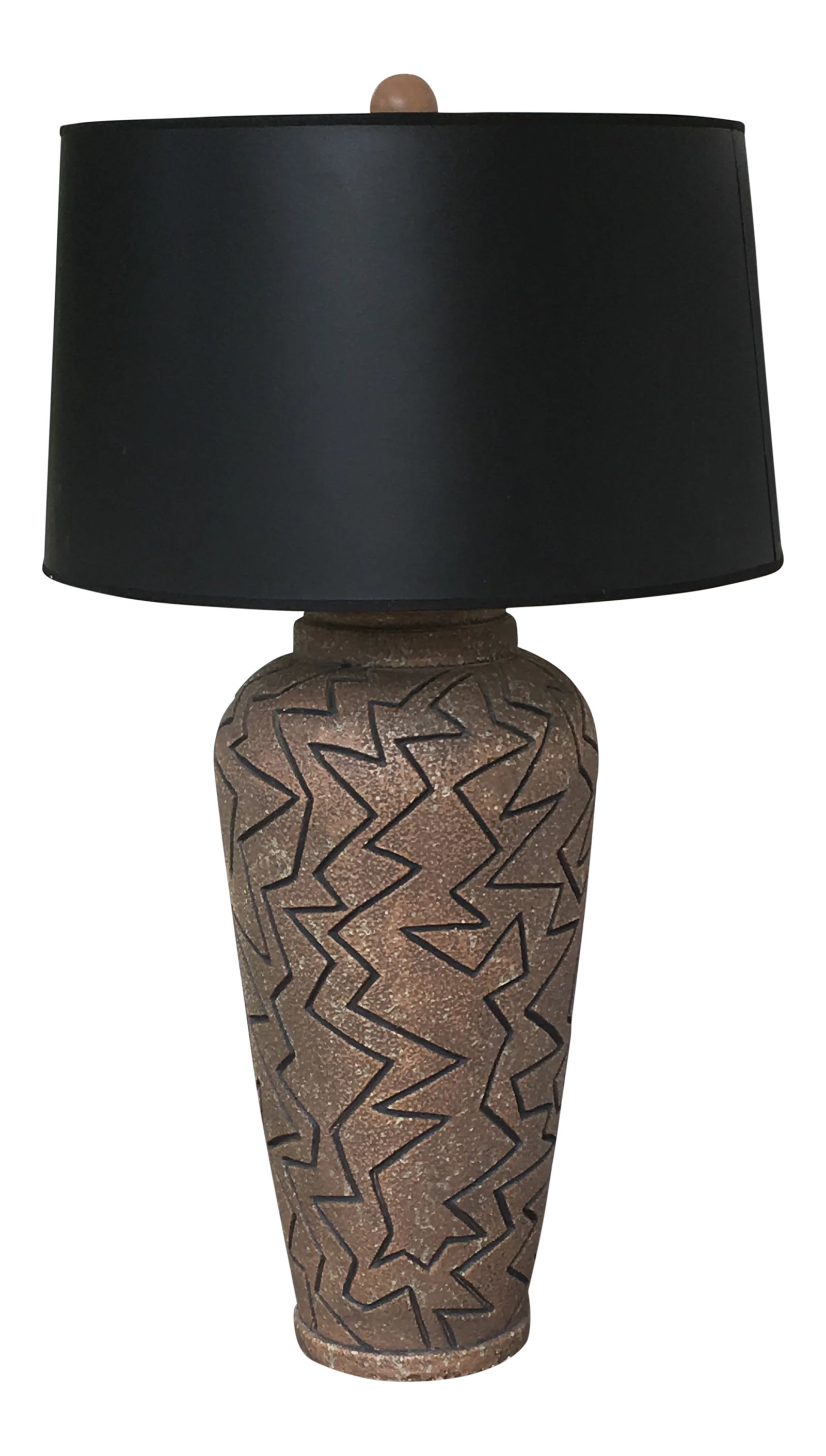 Vintage Lee Reynolds Vanguard Studio Lamp: Large vintage Vanguard Studios lamp signed by Lee Reynolds. Textured ceramic finish with rustic colors with geometric carved design. Lamp measures 33" tall to the top of finial. Base is 20&1/2 in.