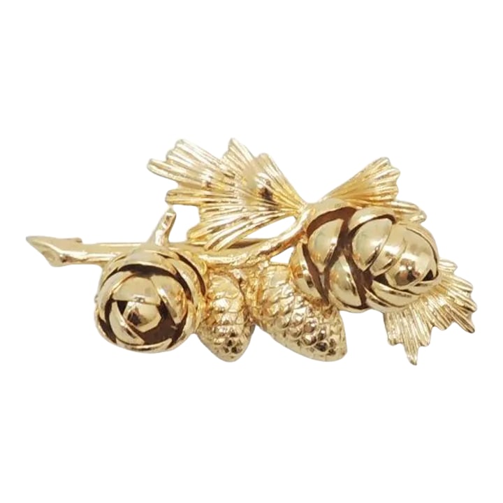 Vintage 1950s Signed Napier 3D Acorns Brooch: This is part of Chairish's Costume Jewelry assortment. 1950s goldtone 3d acorns brooch with security clasp. Marked "Napier." Measures: 1 1/4 inches long by 2 3/8 inches wide. Excellent condition.