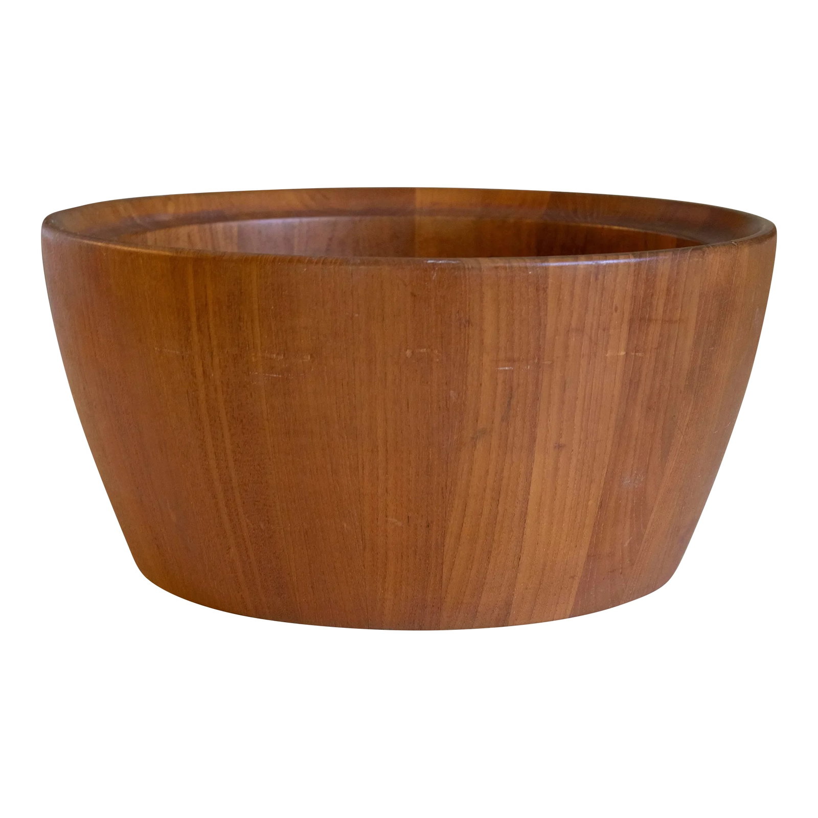 Massive Danish Teak Staved Bowl Nissen: Massive danish teak staved bowl by Nissen, Denmark. This bowl is as is with one area of separation at the staved seam--see pictures. Will need to be repaired depending on use but could function as a