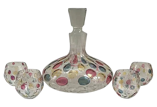 Mid-Century Vintage Iridescent Pink Blue & Yellow Decanter and Glasses - Set of 5: Fabulous large hand-blown decanter with removable stopper decorated in pink, blue and pale yellow iridescent polka dot motif with four matching cocktail glasses. No maker's mark. Dims: Decanter, 8