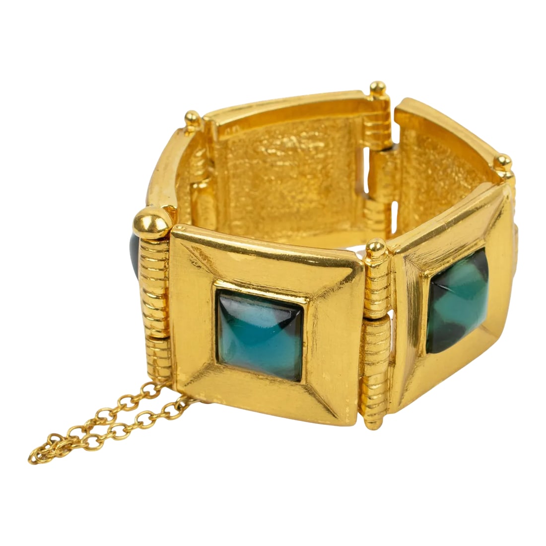 Jean Louis Scherrer Gilt Metal Jeweled Link Turquoise Resin Cabochon Bracelet: This lovely Jean Louis Scherrer Paris link bangle bracelet features a geometric shape in shiny metal ornate with resin cabochons in transparent turquoise blue color. The security chain and closing