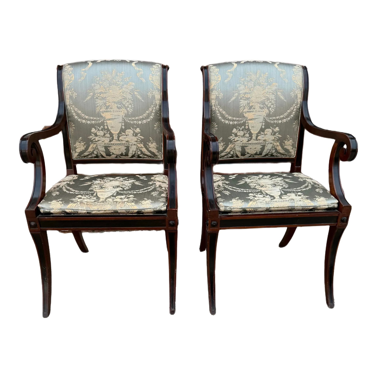 Pair Baker Furniture Regency Dining Chairs With Klismos Legs: Pair of regency style arm chairs by Baker furniture, circa 1960s. The British regency period was most notably influenced by the exotic Greek, Egyptian and Asian furniture to which visitors at