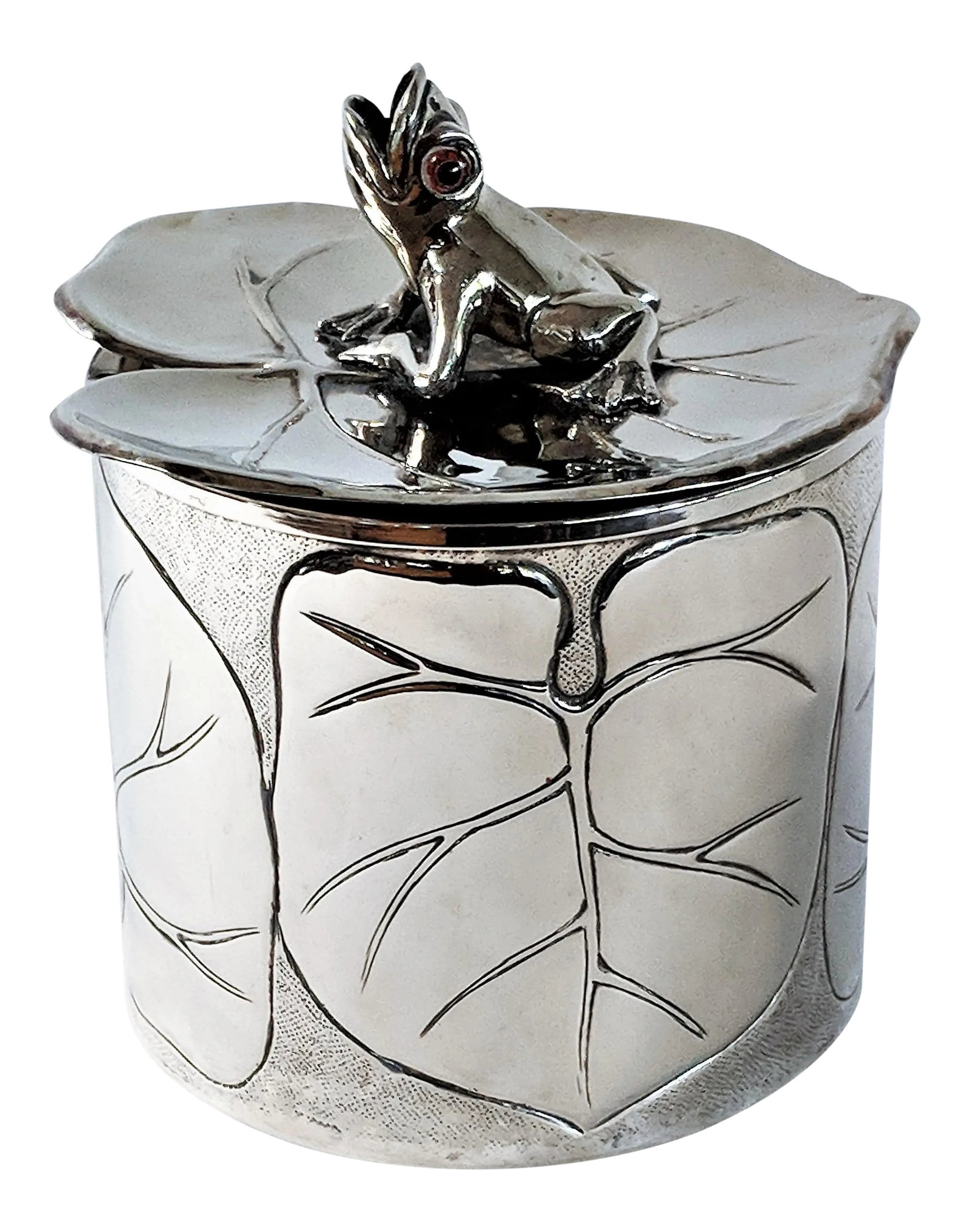 1980s Vintage Silver Plated Frog and Lily Pad Ice Bucket: This is a vintage silver plated ice bucket with incised lily pads and a frog with enamel eyes, making for a whimsical design. There is a signature on the top but it is tiny and illegible even with a l