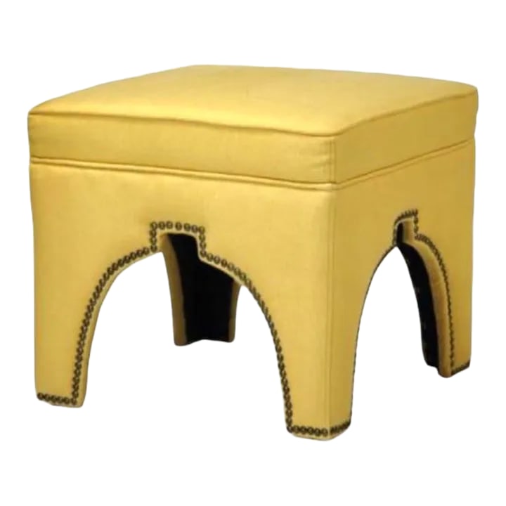 Ottoman Moroccan Cut With Brass Nailhead Trim: Add a touch of Moroccan style to your home with this designer ottoman. This square ottoman features brass nailhead trim and is made of high-quality materials, resulting in a durable and stylish piece