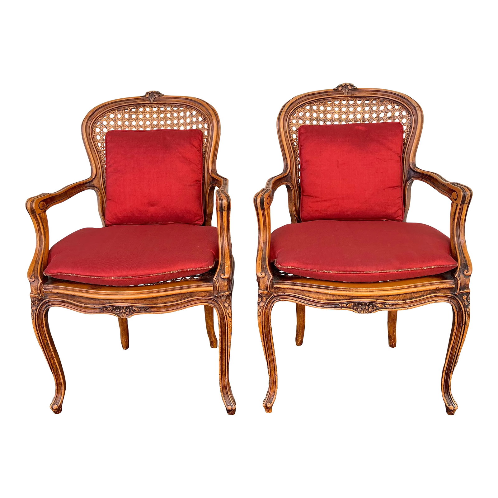 Vintage French Cane Chairs With Cushions- Set of 2: Pair of French Louis XV carved armchairs Hand Crafted in Italy for Classic House of Furniture. Beautifully carved detail in the wood with graceful cabriole legs. The back and seat caned, richly