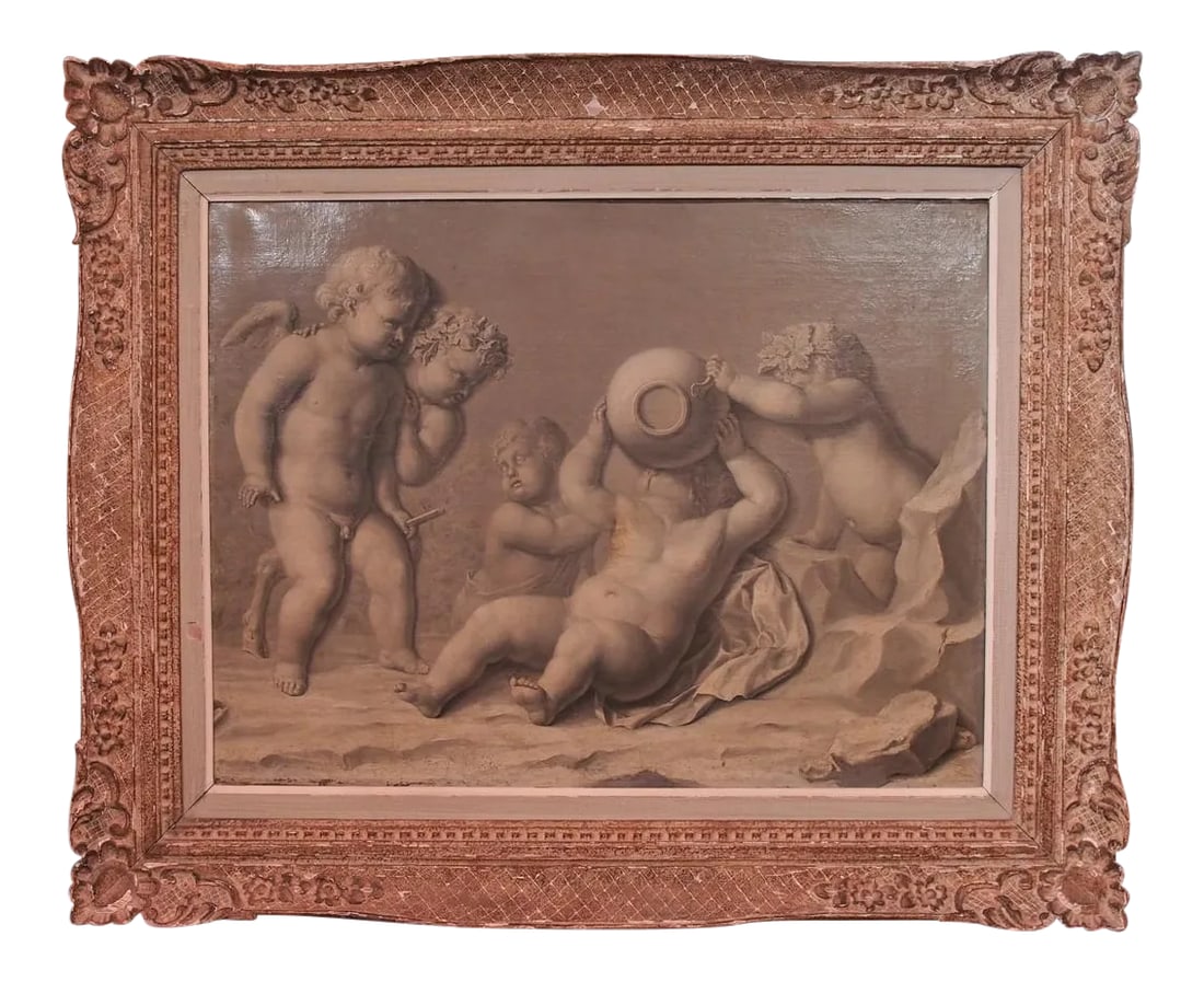 18th Century Framed French Grisaille Painting on Canvas: Large canvas grisaille painting of cherubs, one with wings and hooves. Two of them are crowned with a wreath of grape leaves. The mischievous cherub is happily drinking more wine than he should. The