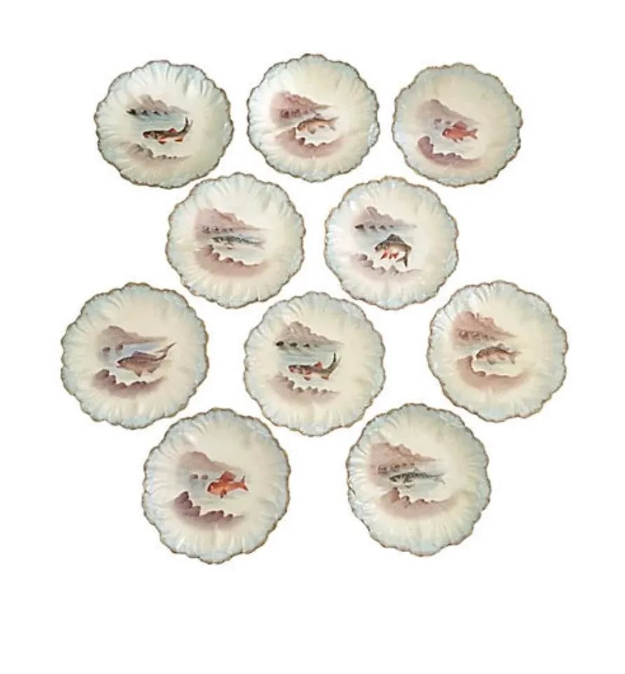 Limoges Hand Painted Fish Plates - Set of 10: Set of ten hand painted porcelain Limoges fish plates. Signed "Limoges France." Condition: Alterations: Original Condition Unaltered Imperfections: Some Imperfections Condition Notes: Wear consistent