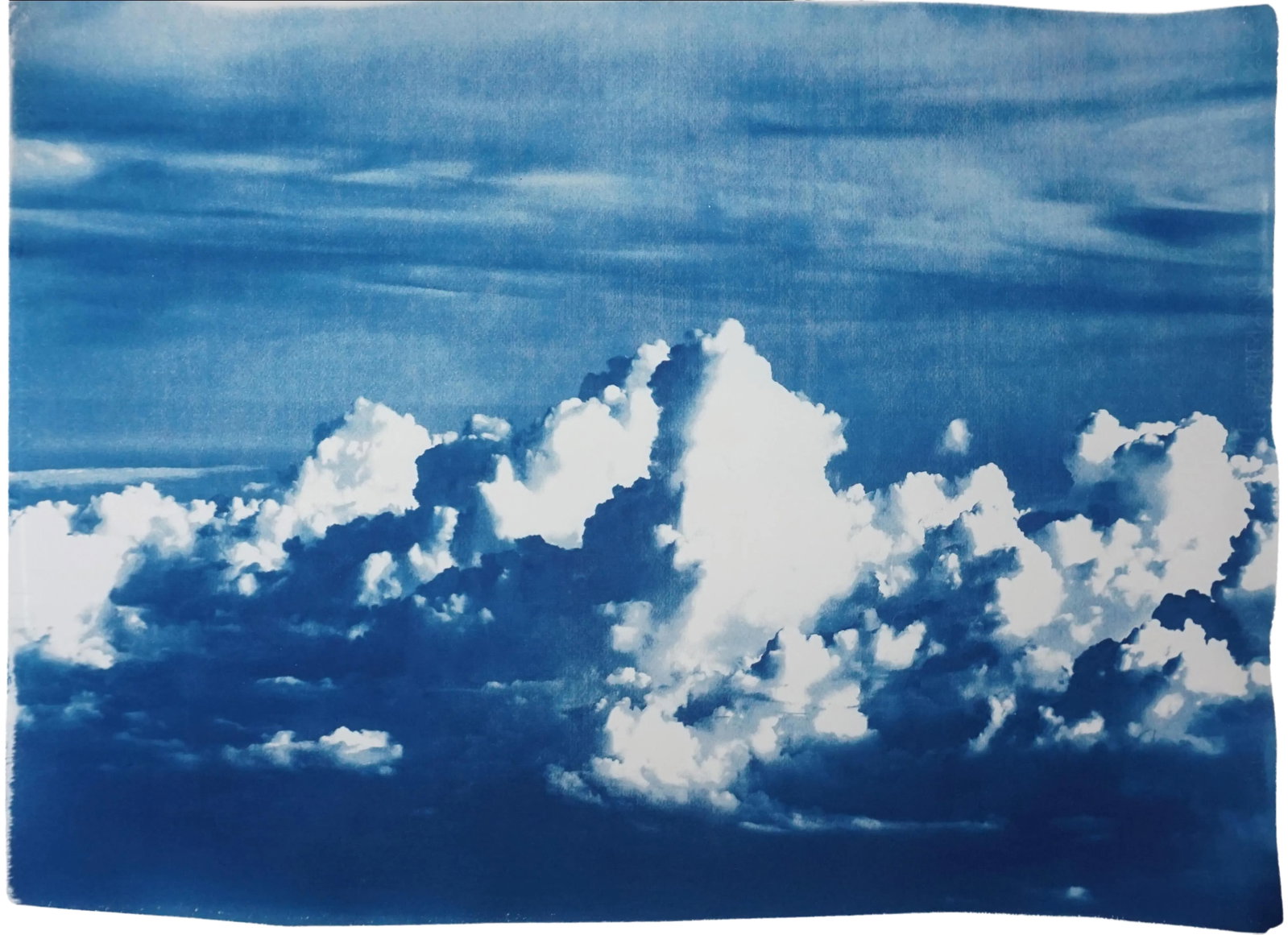 Blustery Clouds After a Storm, Sky Blue Handprinted Cyanotype on Watercolor Paper, Meaningful Scene: This is an exclusive handprinted limited edition cyanotype. "Blustery Clouds" is an cyanotype of the semi-abstract patterns of clouds in the sky after a storm. Details: + Title: Blustery Clouds +