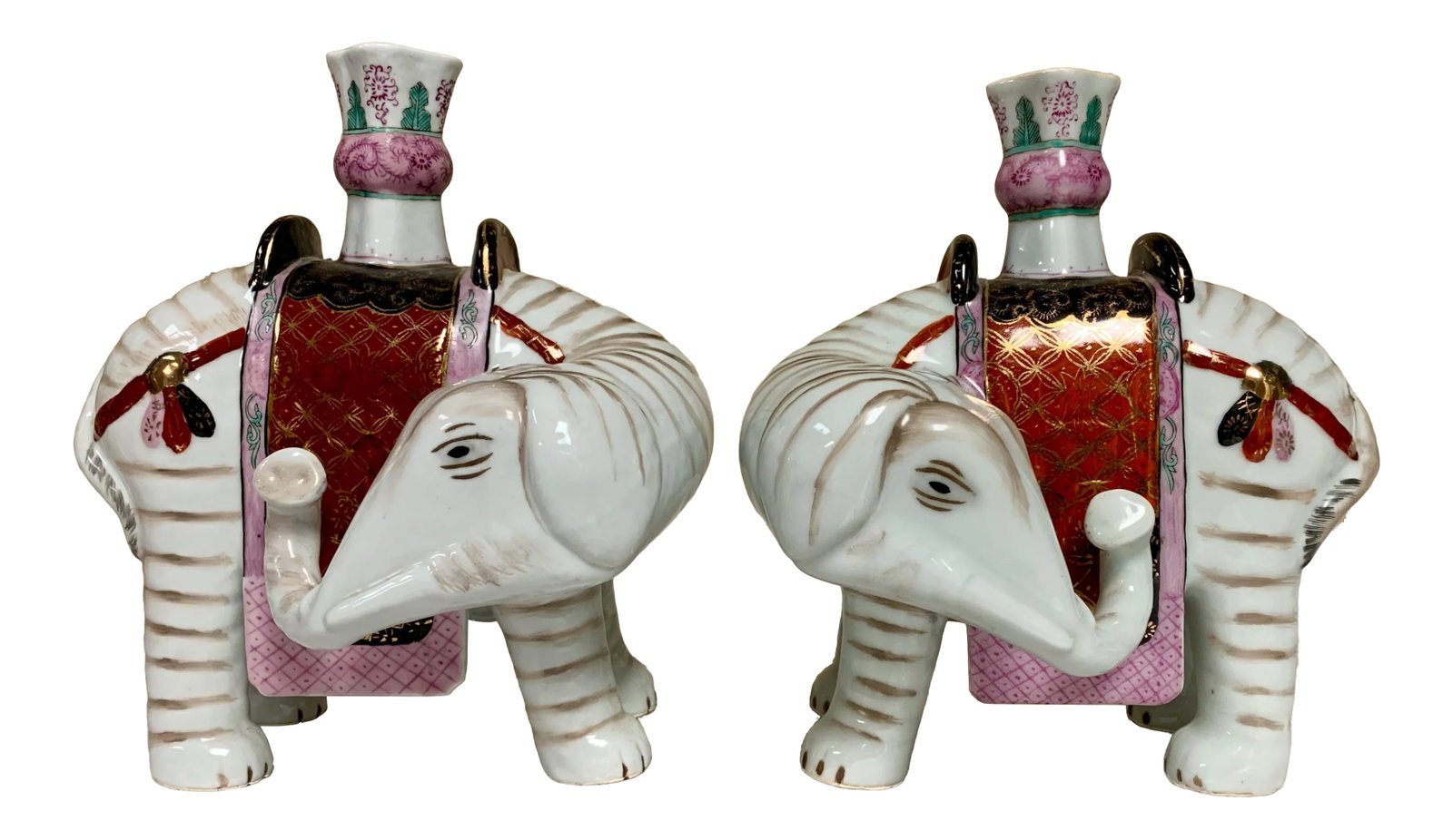 Mottahedeh Elephant Candlesticks - a Pair: This is a pair of marked elephant Mottahedeh candle holders in very good condition. Condition: Alterations: Original Condition Unaltered Imperfections: Some Imperfections Condition Notes: No issues