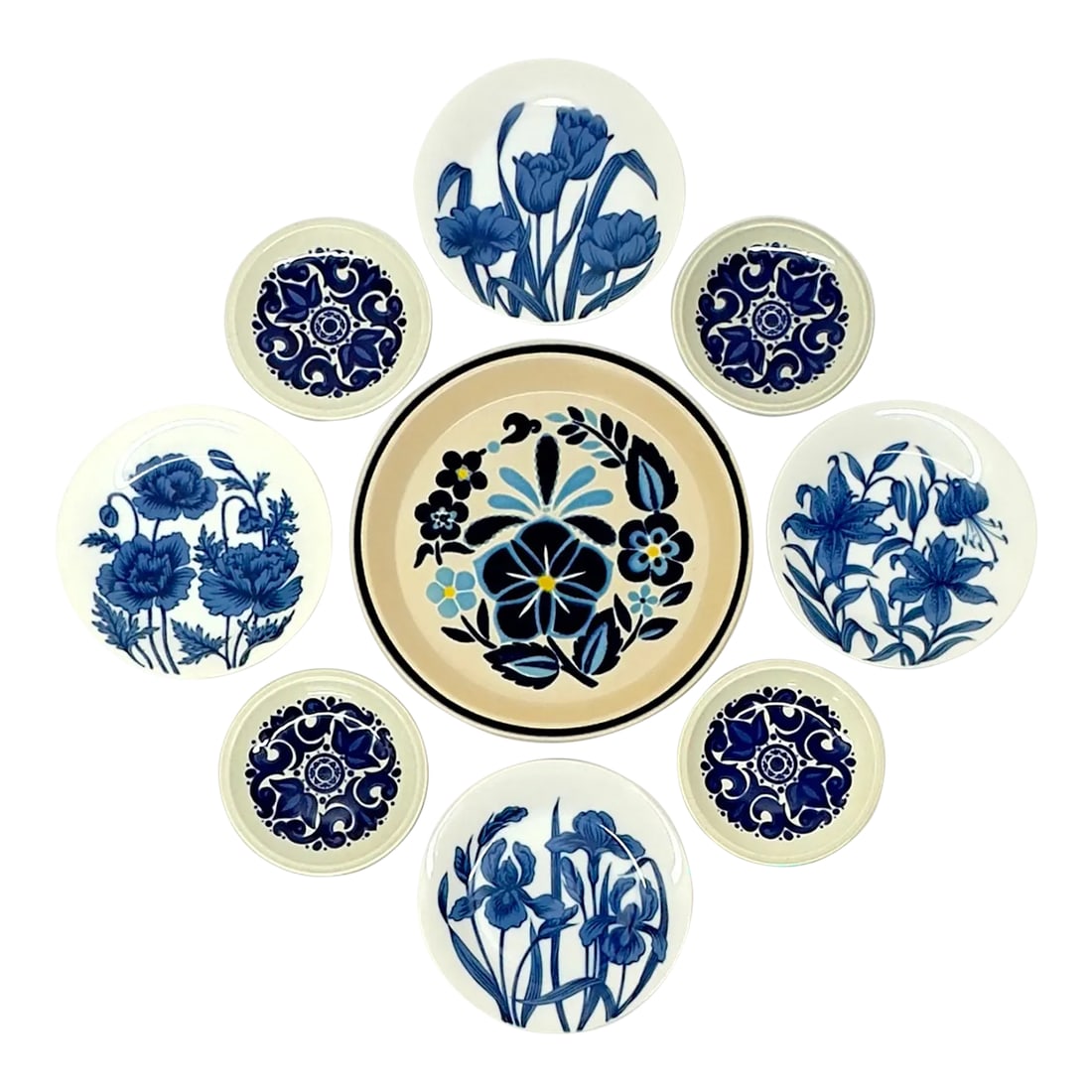 Graphic Floral Blue & White Wall Plate Curation - Group of 9: Blue and white graphic floral wall plate curation, group of 9. This is a beautiful collection of graphic decorative plates, in a range of designs and sizes, all showcasing a blue and white floral
