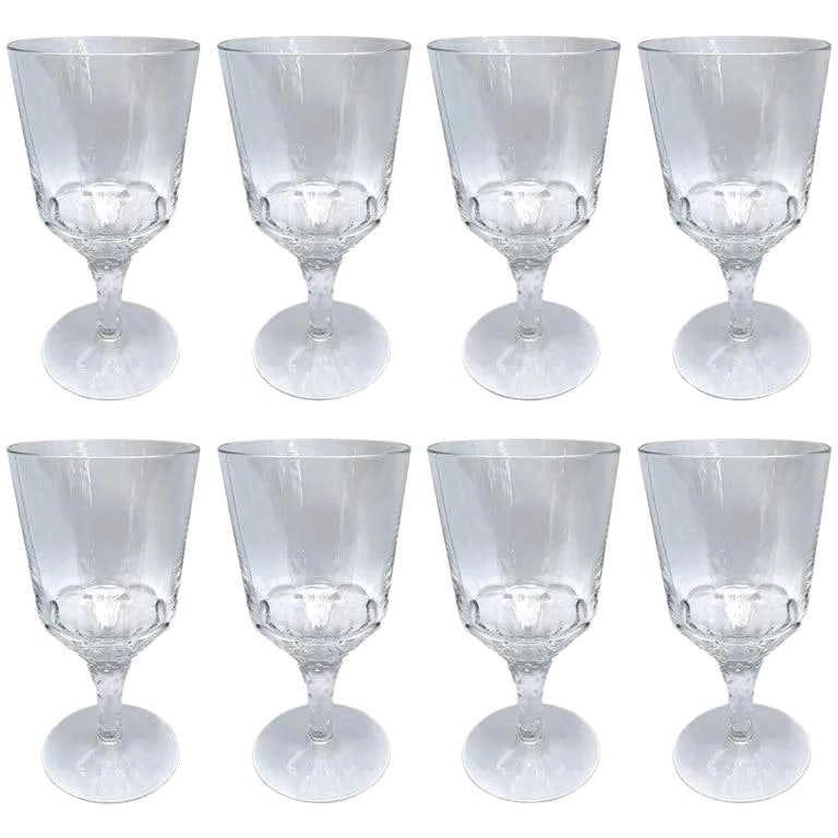 Set of Eight Hand-Blown Crystal Wine Glasses: A fantastic set of eight heavy hand-blown crystal wine glasses, inspired by 18th century Georgian wine goblets, each with a facet-cut stem. Condition: Alterations: Unknown Imperfections: Some Imperfec