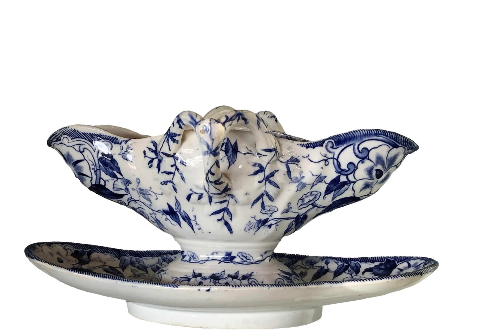 French Blue "Flora" Porcelain Gravy Boat: This beautiful French porcelain gravy boat, sauce boat or sauciere is from Creil et Montereau in the blue Flora pattern which is made up of blue and white Morning Glories. The handles are like