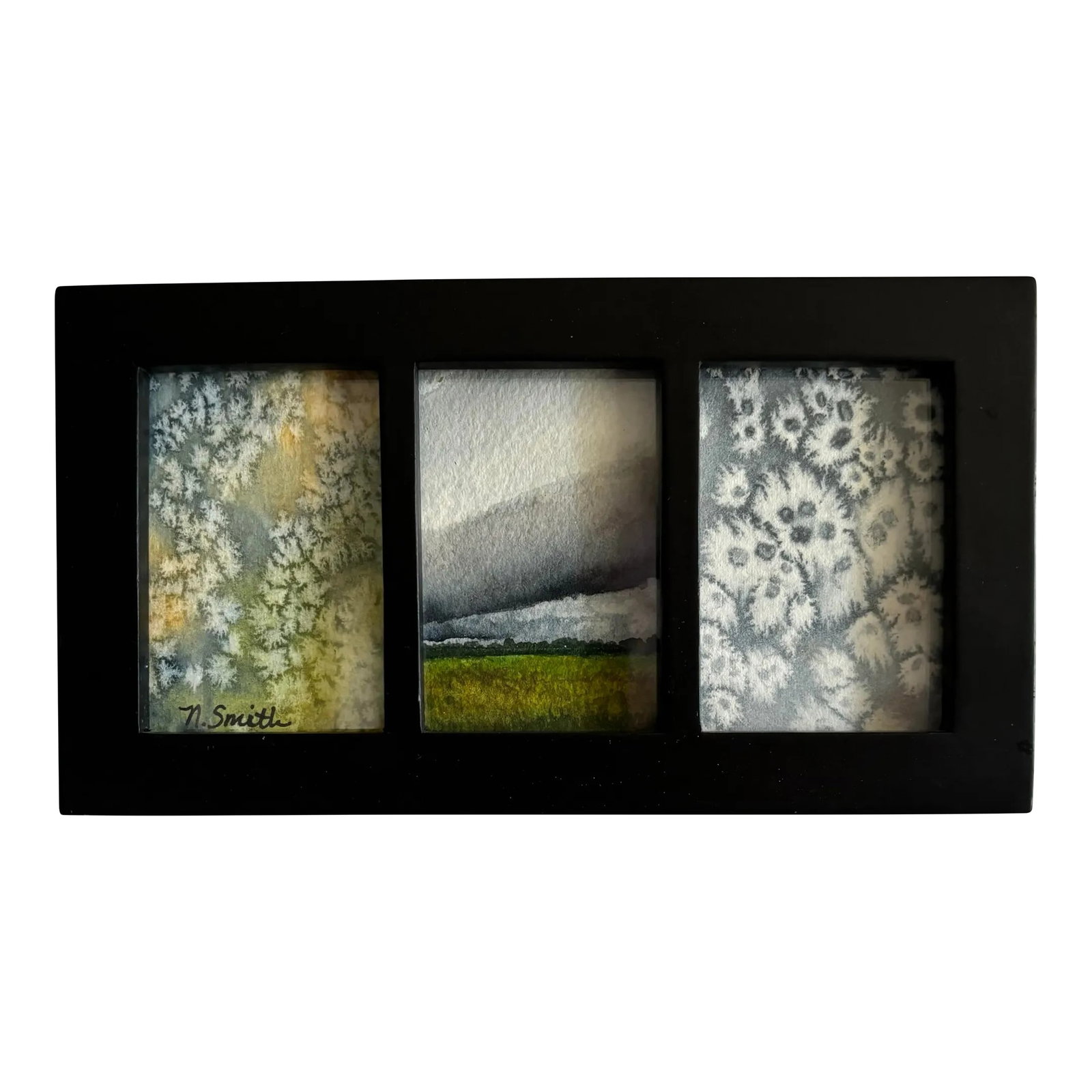 Miniature Trio of Original Watercolor Paintings Signed and Framed: Watercolor painting of a field on a cloudy day just before a storm rolls in, sandwiched between two complementary abstract paintings. Greens, grays, and whites shared throughout. Framed in a simple