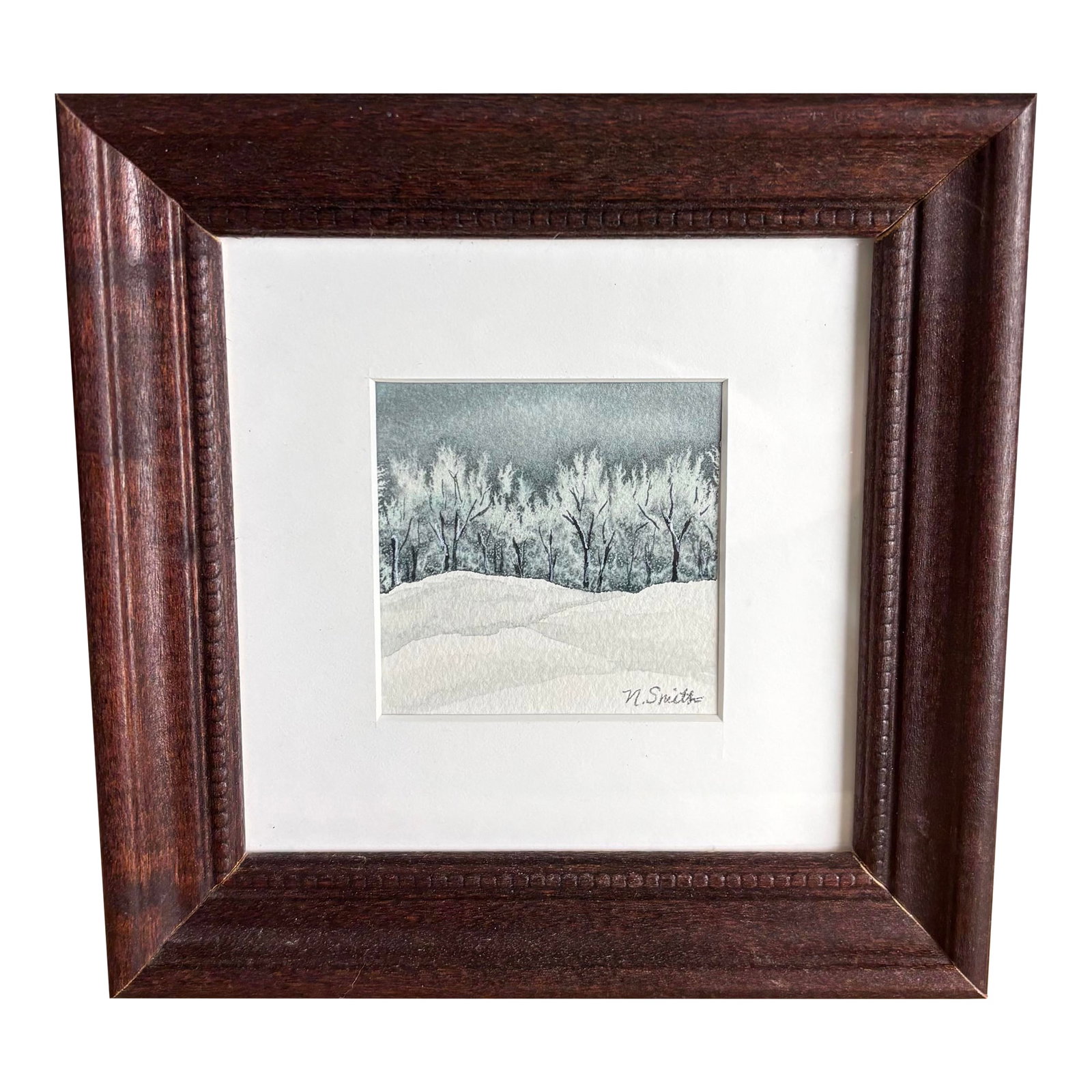 Frozen Silence - Miniature Original Watercolor Signed and Framed: This moody winter landscape captures the stillness of snow-covered trees under a heavy sky. The forest appears frozen in time, offering a contemplative and slightly mysterious feel to any space.