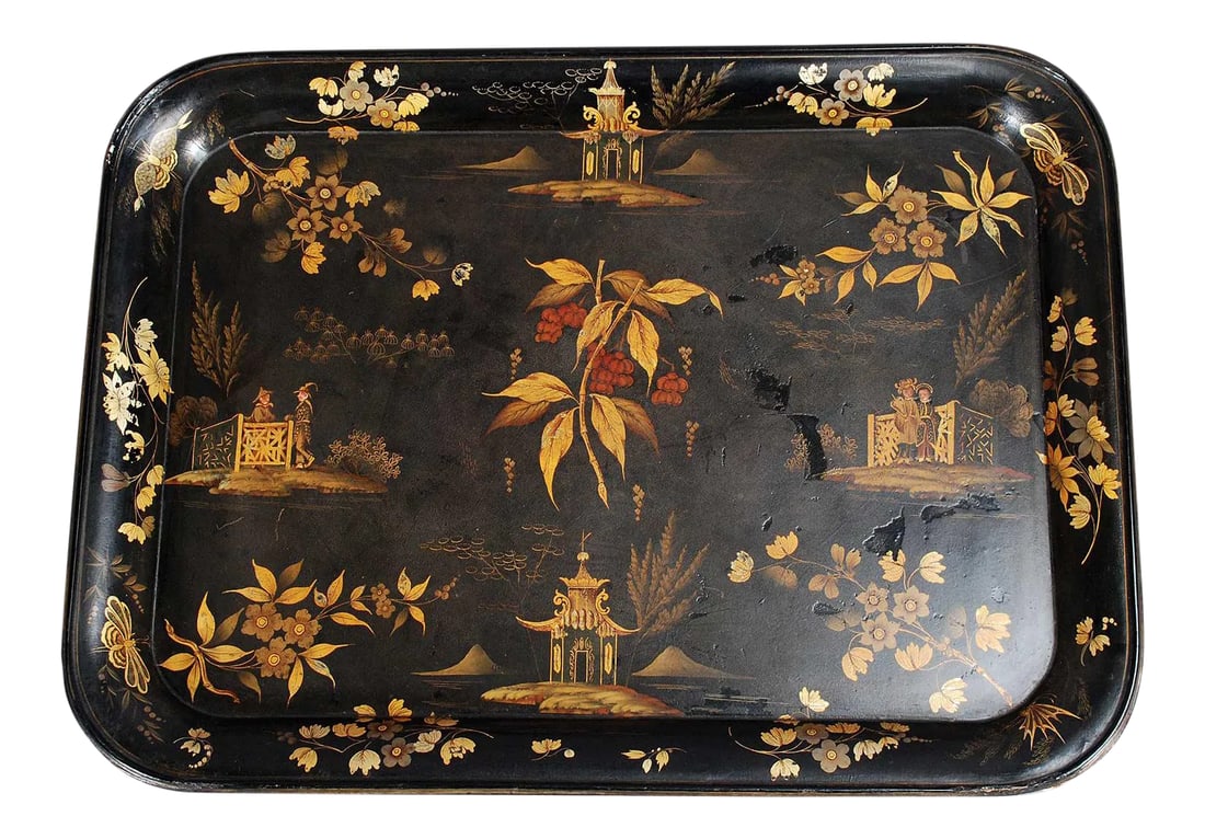 Antique Black Chinoiserie Tray by Ryton and Walton: A black chinoiserie tray with rolled edges depicting a central vignette of a sprig with red berries surrounded by pagodas, figures, butterflies, and flowers. Impressed on the reverse with the mark of 