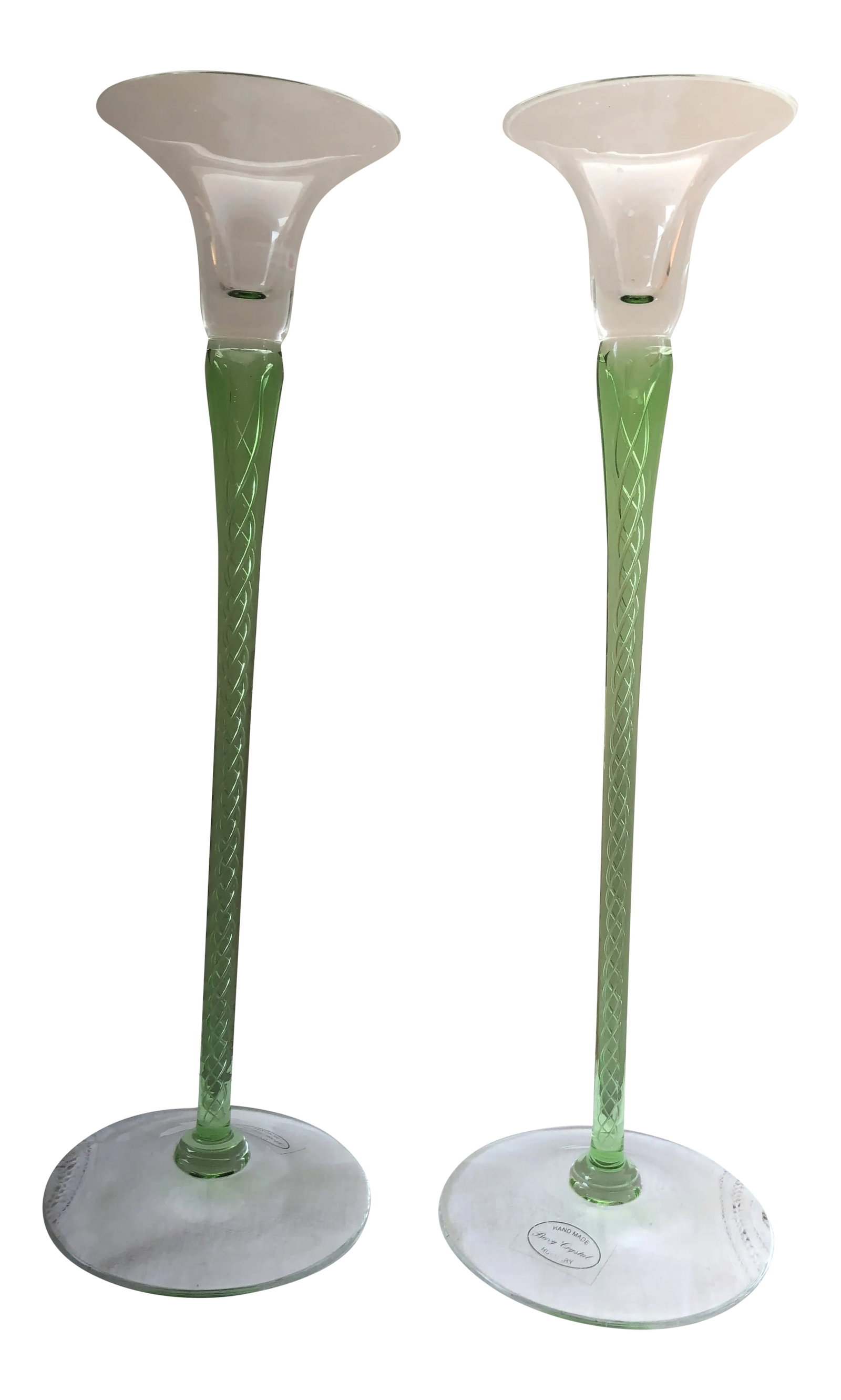 Hungarian Crystal Candlesticks - a Pair: These are a pair of candlesticks. They are clear glass with twisting spirals of green glass inside the wand of the candlestick. A beautiful accent to any table/dinner or wine tasting. They are