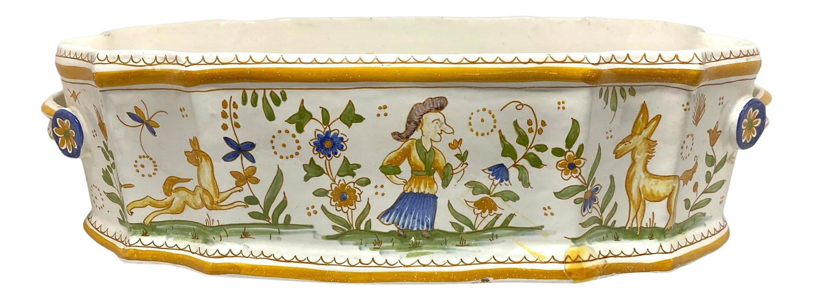 French 19th Century Vintage Faience Pottery Jardinaire: A fine French 19th century polychrome Faience jardiniere painted in pastel tones with figures and animals and flowers. The piece has strap handles on the edge and serpentine shaped sides. There is a