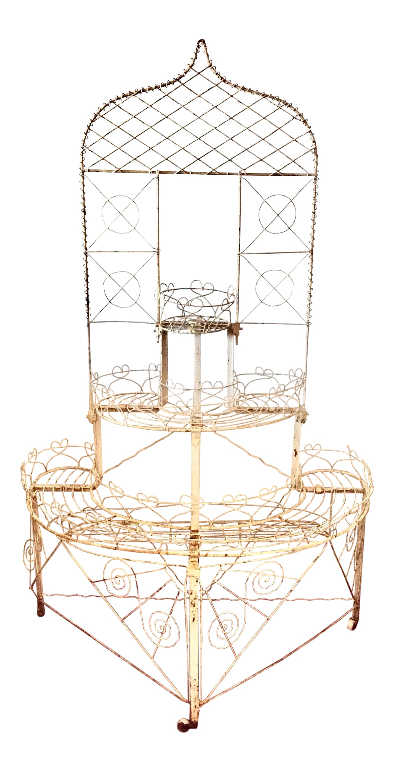 Antique French Wire Garden Plant Stand: An antique French wire garden plant stand with original white paint. Has ceramic casters dating it back to the Victorian period. Charming yet stately. Great condition. There is an additional removable