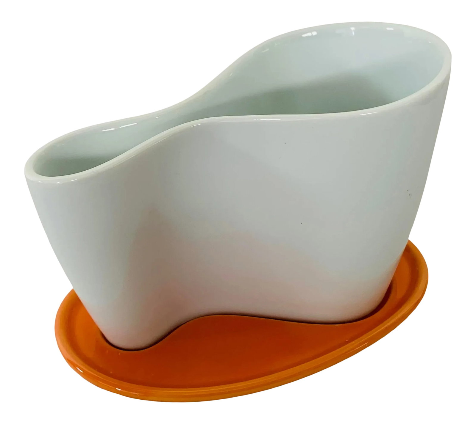 Dub Cup & Saucer by Karim Rashid for JunTomita: This brilliant little set was designed by Karim Rashid in 2008 for the Japanese company, Jun Tomita. Known for their beautiful tea ware, this fit right in coupled with Mr. Rashid aesthetic inspired by