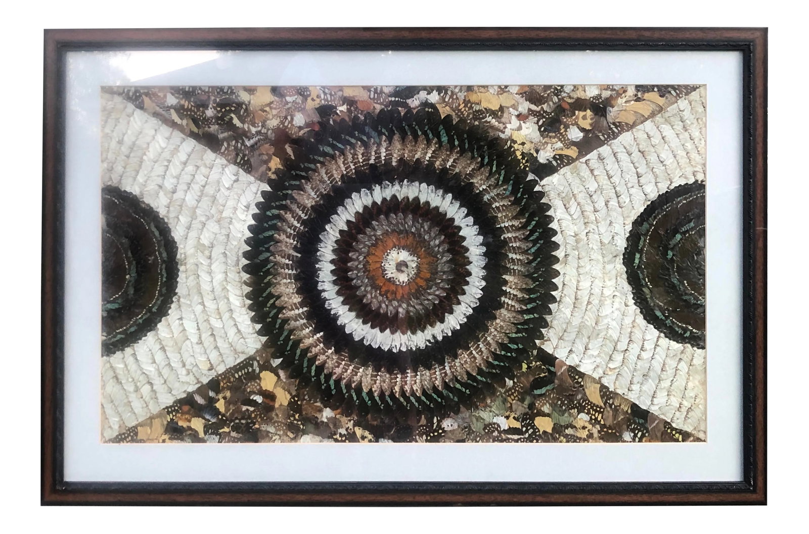Vintage Butterfly Wing Kaleidoscope Art: Exquisite African art. Fine intricate art made of thousands of butterfly wings laid out interlocking and overlapping to create a kaleidoscope image. Matted and framed. Condition: Alterations: