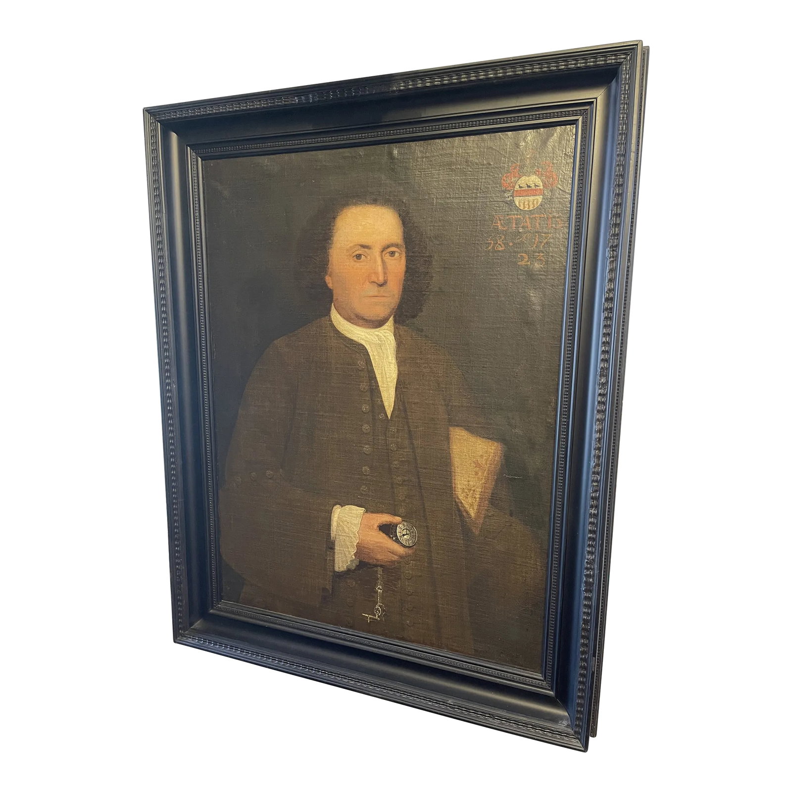 1723 Portrait of a Man With a Pocket Watch and Crest Oil Painting, Framed: A George I period portrait of a man with a pocket watch. Crest in upper right corner. Dated 1723. Oil on canvas. Condition: Alterations: Original Design Modified Imperfections: Some Imperfections Cond