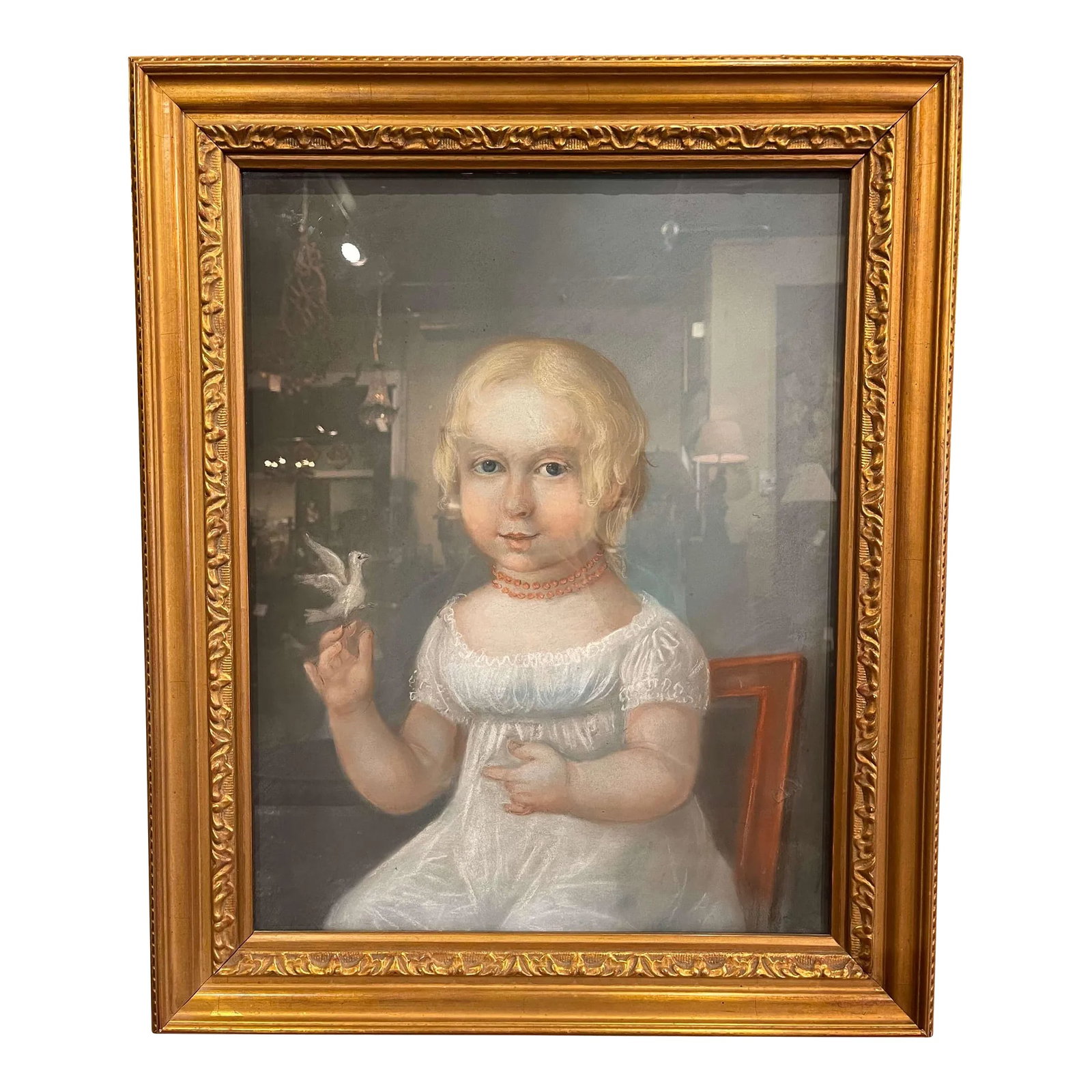 Late 19th Century French Young Girl With Bird Pastel Portrait in Gilt Frame: Decorate a study, bedroom, or living space with this beautiful antique pastel masterpiece. Created in France circa 1880, the artwork depicts a young blonde girl sitting in a chair seemingly gazing at