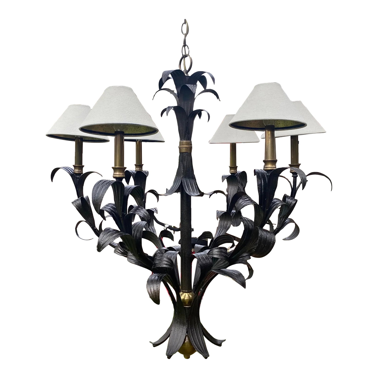 Hand Crafted Scroll Leaf Chandelier: Scrolling leaf chandelier with brass accents. Hand crafted in a dark bronze almost black textured finish. Six candle lights with metal shades covered in textured off white and gold inside. This