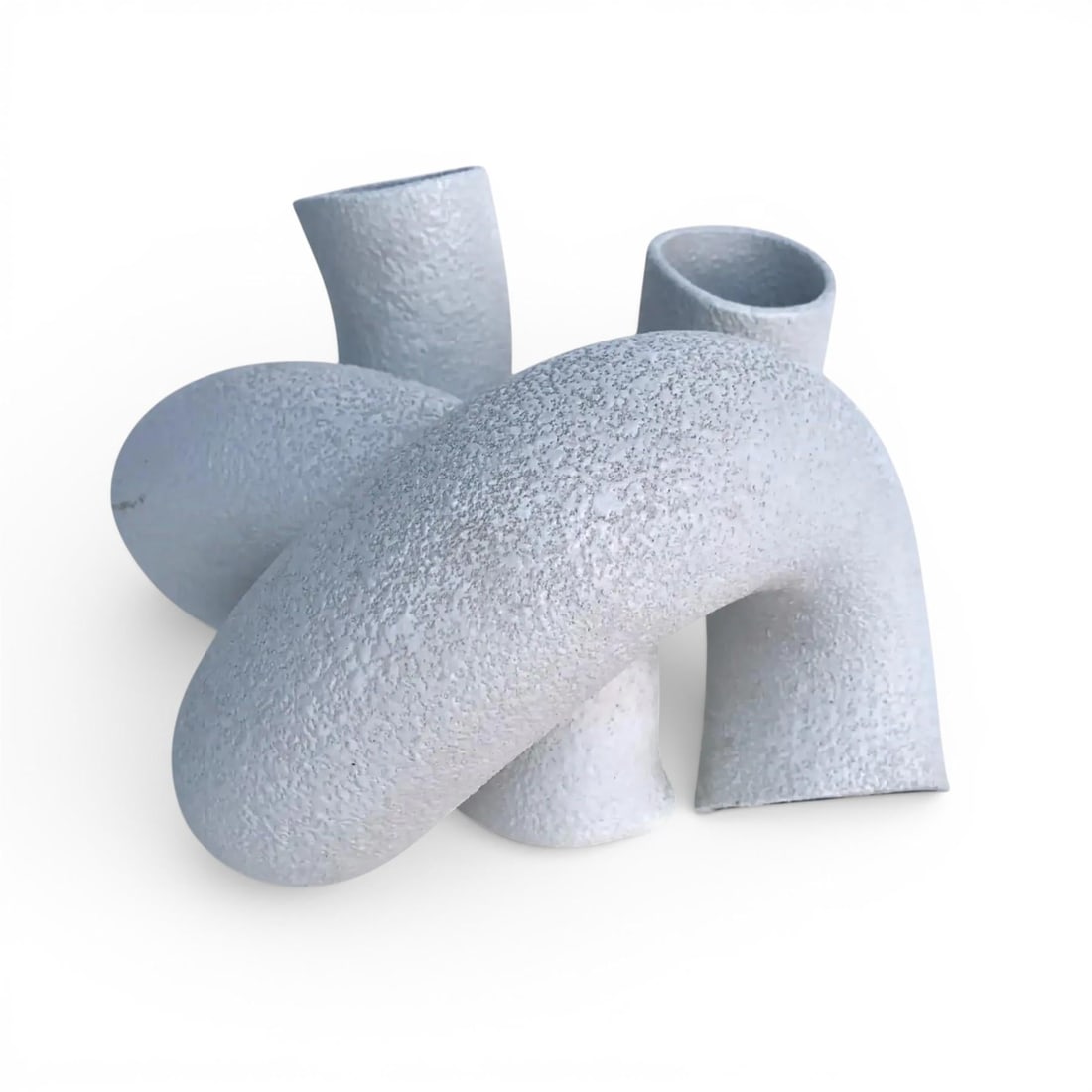 1970s Vintage Italian Abstract Ceramic Tube Sculpture: Vintage Italian textured ceramic abstract tube sculpture. This piece is very unusual, small in size, but a large statement piece. Multi-tube design, weaving in and out of one another, made with white