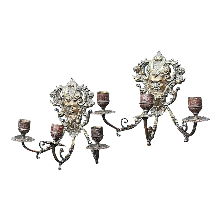 Antique 1900s French Bronze Wall Candle Sconces - a Pair: antique wall candle sconces. Made of bronze.Designed with beautiful scrolls. There are three candle arms designed to hold tapered candles. Good condition with great patina. Dimensions: Height: 7.4 inc