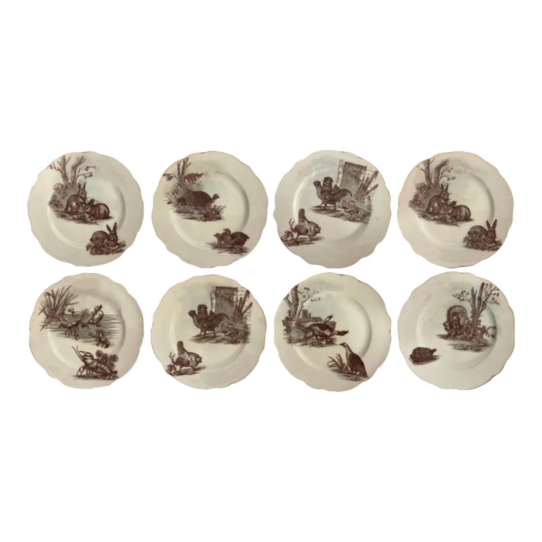 19th-Century Set of 8 French Limoges Dessert Plates - Rabbits, Birds, Puppies: This such a sweet set of 19th century Limoges dessert plates. They have pastoral themes ranging from rabbits to turtles. Two are replicated. Would be lovely in a variety of setting, like a nursery or