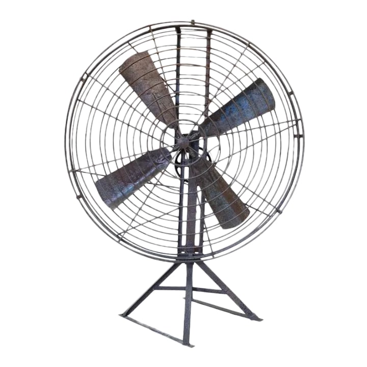 Large Metal Fan Circa 1930: The antique huge fan, equipped with a functioning lever to power the machine, dates back to around 1930 and was originally utilized to generate wind effects for movie sets. This remarkable piece