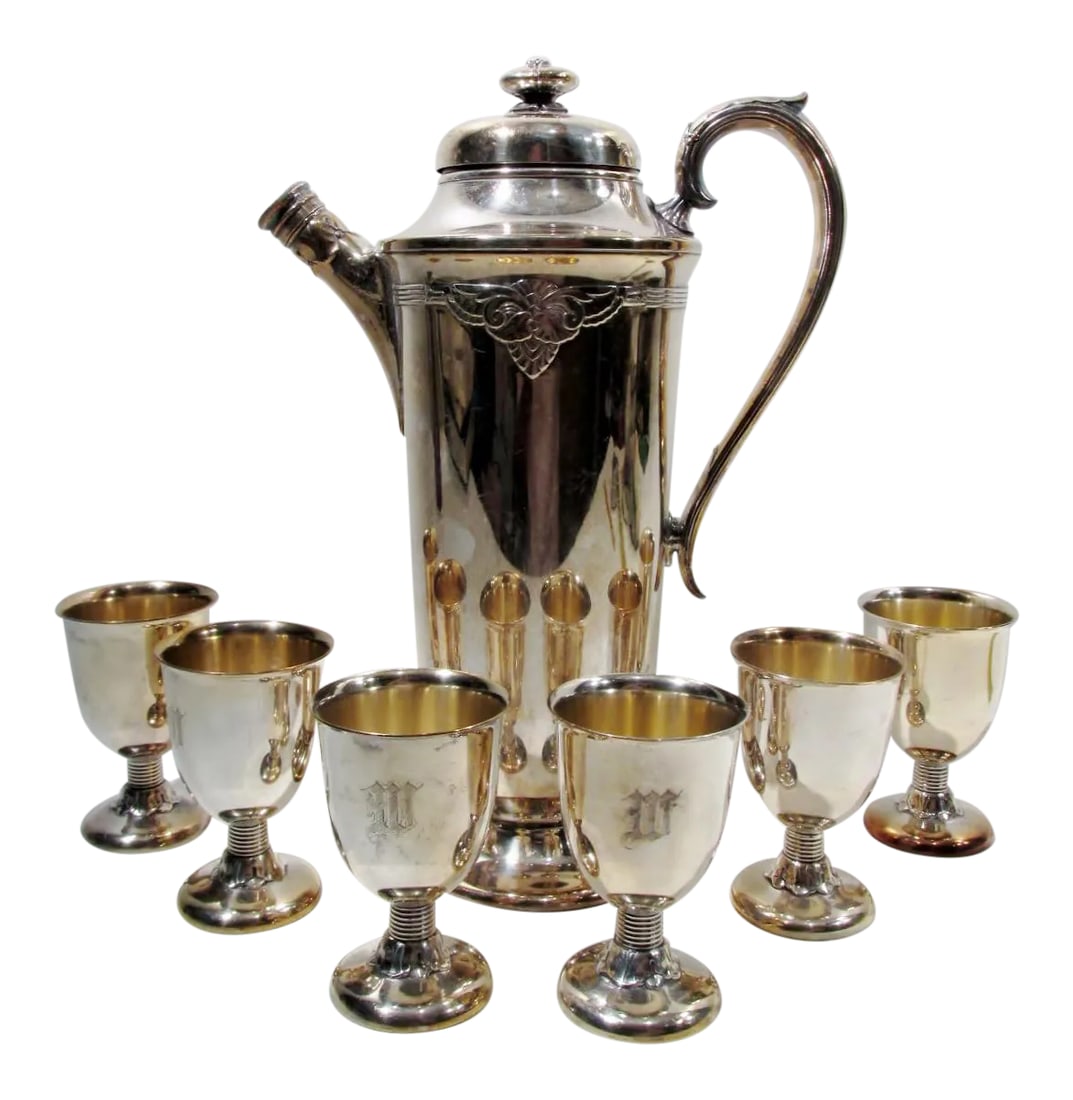 International Silver Guild Cadence Cocktail Shaker Set - Set of 7: Rarely seen seven piece 1920s Jazz Age silver plate cocktail shaker set from International Silversmiths Wm Rogers division in the Art Deco Guild-Cadence pattern. Includes an 11.5" tall #5320 martini
