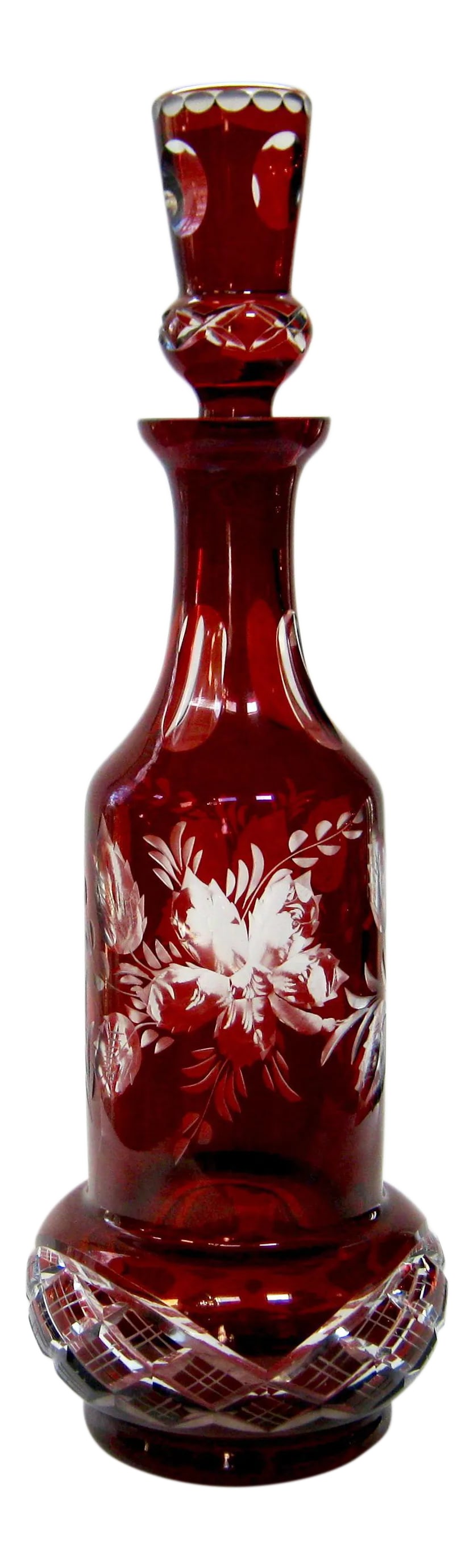 Antique Bohemian Etched & Cut Glass Decanter: Impressive, tall, deep ruby red etched and cut antique Bohemian glass decanter. Cut leaf and floral decorative enhancements surround this fabulous piece. There are no flakes, chips or damage.