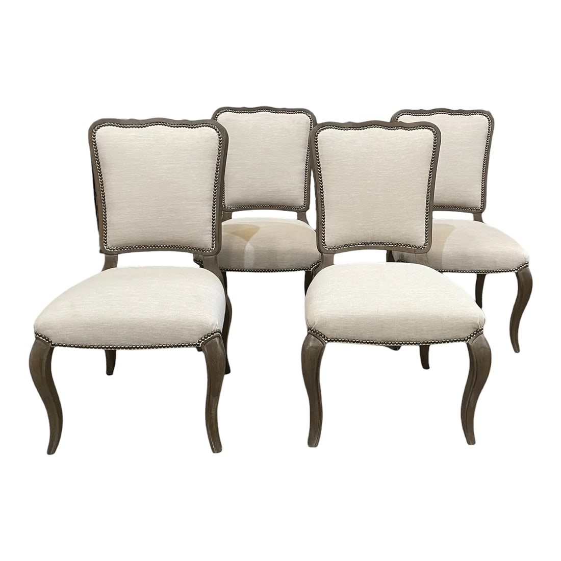 Bernhardt French Traditional Side Chairs by Bernhardt - Set of 4: These beautiful, weathered oak side chairs are from the exclusive Auberge collection by Bernhardt. Upholstered in a natural, cream fabric with antique nickel nail head accents. Bring a touch of the