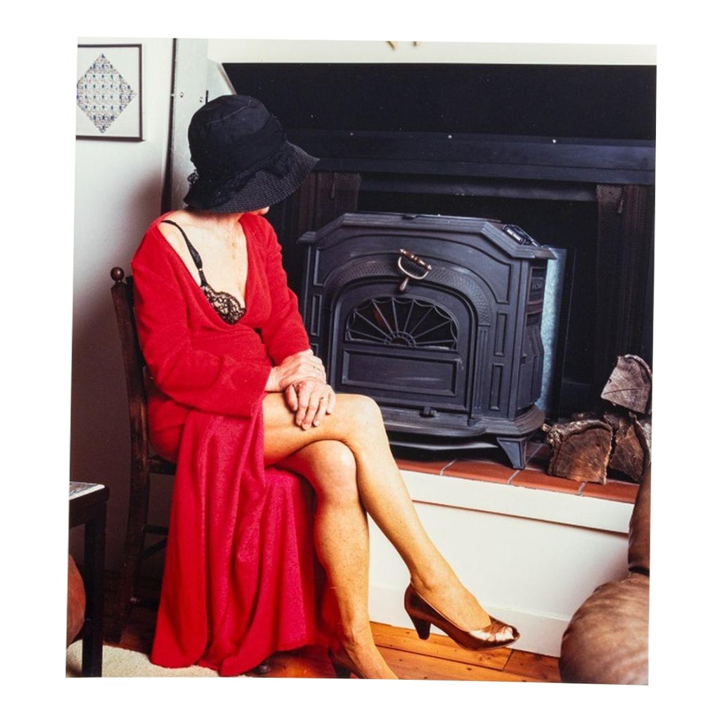 Anne Sager Seated Female Figure Photograph C-Print: Anne Sager (American, 1930-2024), Seated Female Figure, Color Photograph, Chromogenic Print, from the "Women Over 50" series, woman in lingerie and red silk robe, stamped "Anne Sager 19" to verso,