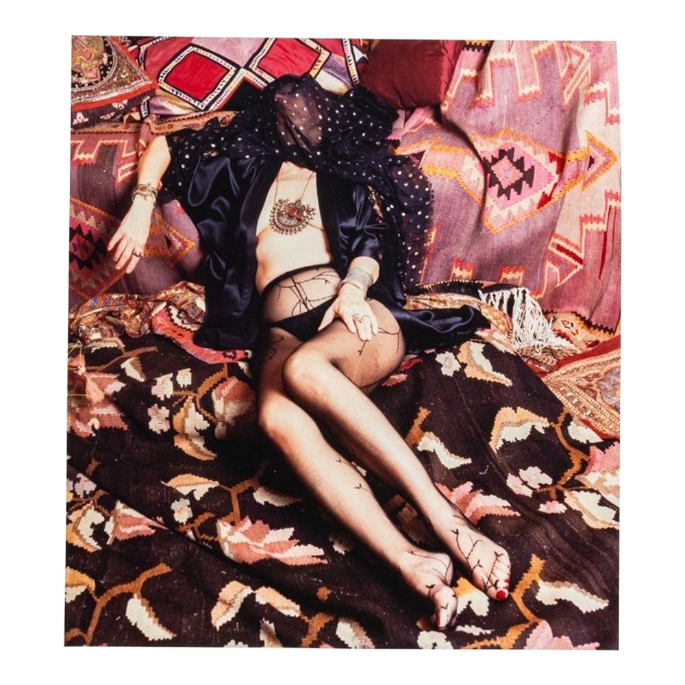 Anne Sager Reclining Female Figure Photo C-Print: Anne Sager (American, 1930-2024), Reclining Female Figure, Color Photograph, Chromogenic Print, from the "Women Over 50" series, woman in lingerie, lounging on patterned rugs, stamped "Anne Sager 19"