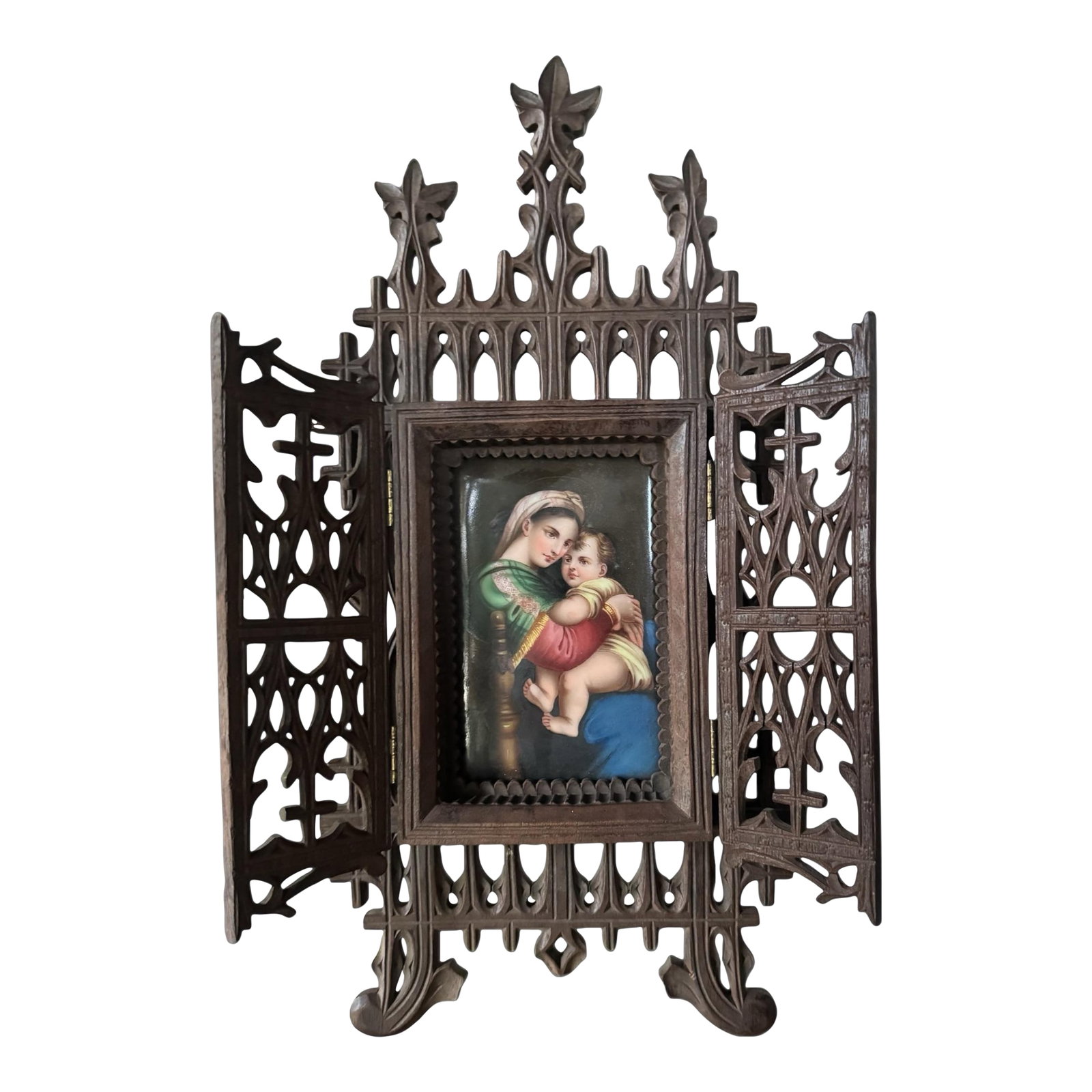 Antique Victorian Hand Painted Porcelain Plaque of Madonna & Child in Easel Back Carved Walnut Frame: Antique Victorian Hand Painted Porcelain Plaque of Madonna & Child in Easel Back Carved Walnut Frame In very good original condition showing some typical age-appropriate wear from normal use, with a